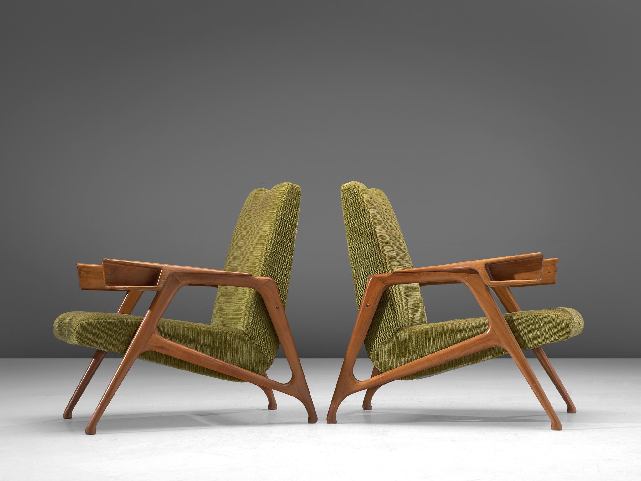 Augusto Romano, pair of lounge chairs, ash and fabric, Italy, 1947.

Architectural armchairs in wood and moss green fabric upholstery, designed by the architect Augusto Romano. High tapered wooden legs provide an open look to the L-shaped seating.