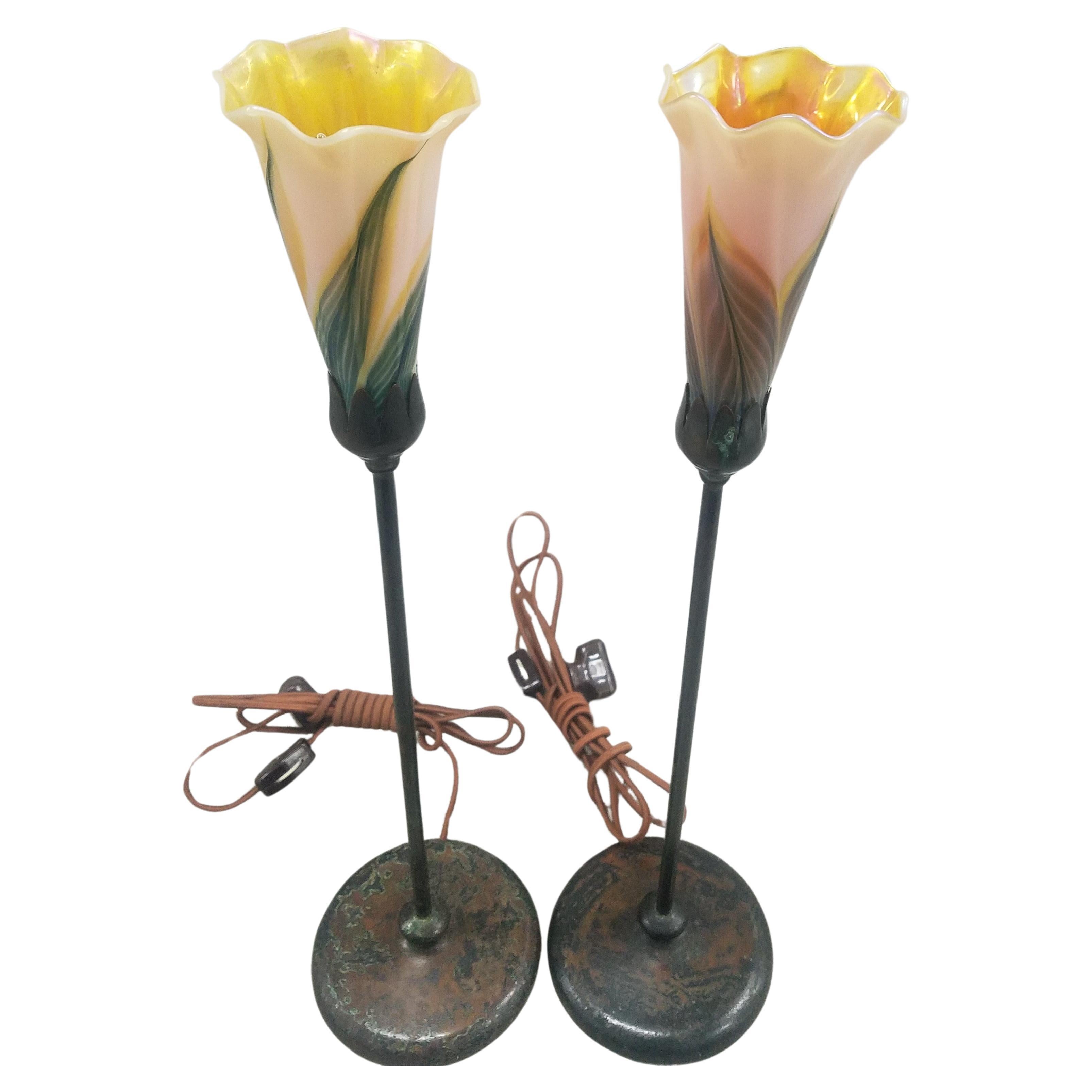 Pair of Aurora Studios Bronze and art glass table lamps For Sale