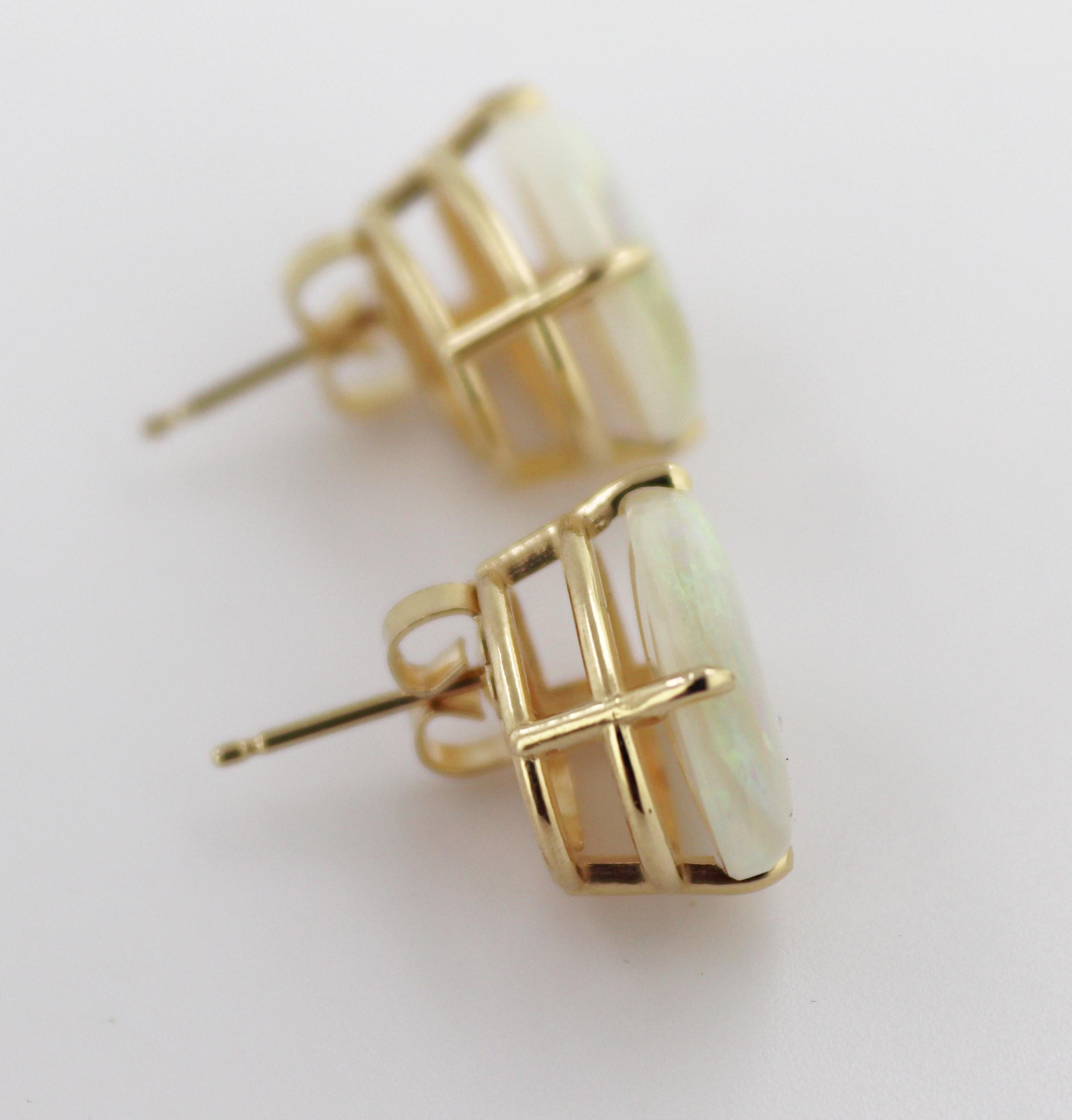 Oval Cut Pair of Australian Opal, 14K Yellow Gold Earrings For Sale