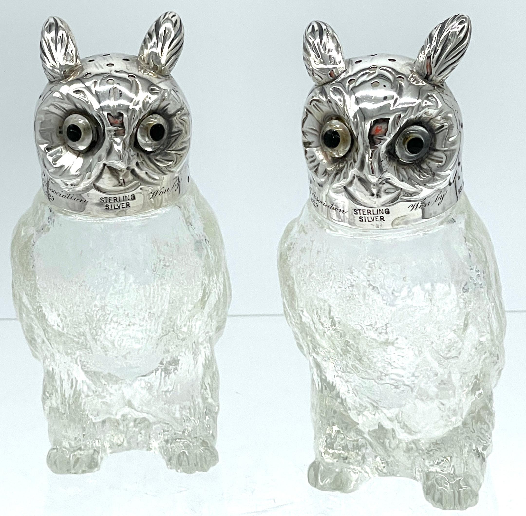 Pair of Austrian Art Deco 'Rock Crystal' and Sterling Owl Salt & Pepper Shakers 
Austria, 1929

A rare find to elevate your dining experience with this exquisite pair of Austrian Art Deco salt and pepper shakers, featuring sterling silver and 