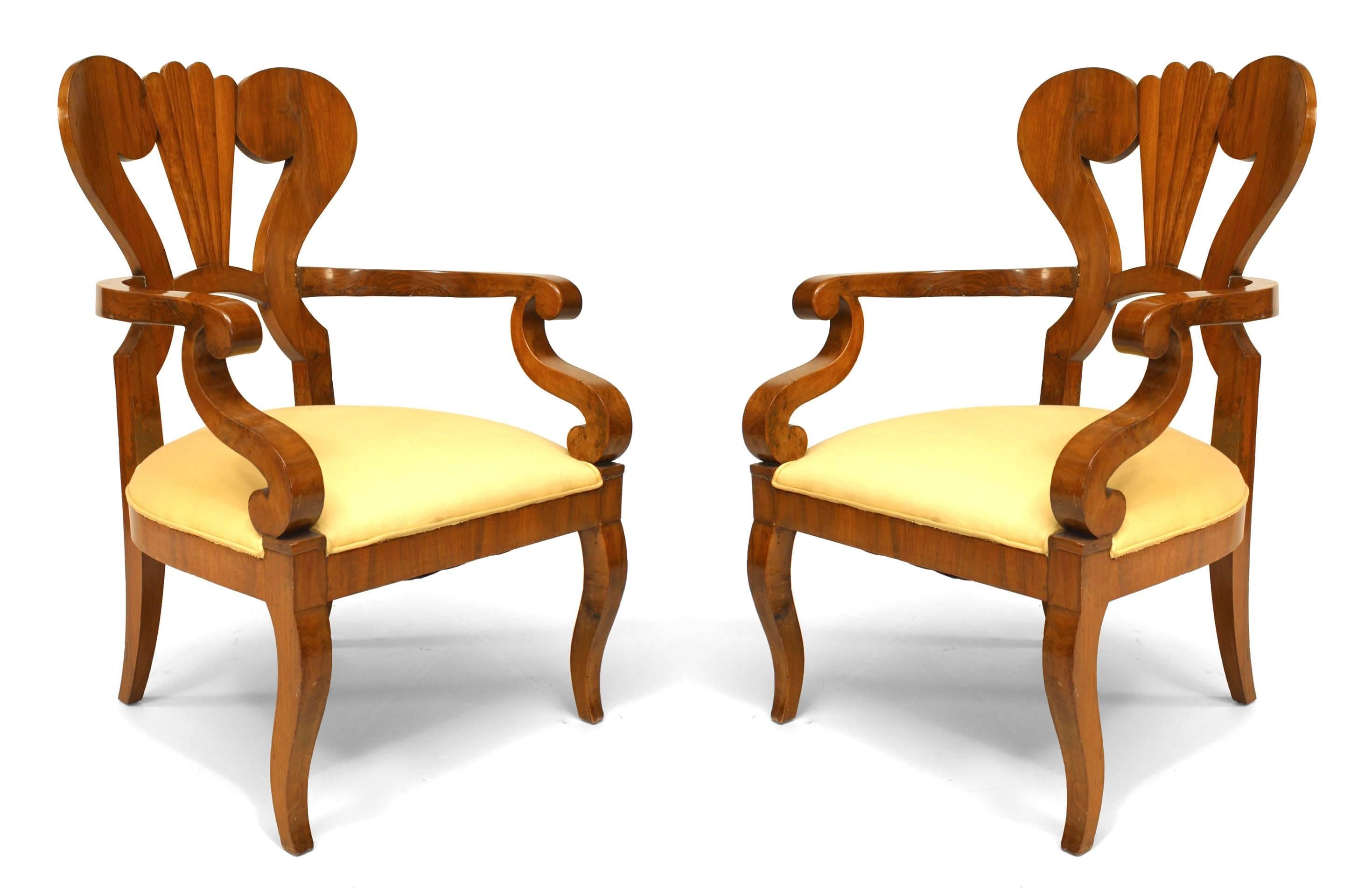 Pair of Austrian Biedermeier cherrywood open Armchairs with fluted fan back design (Circa 1830)
