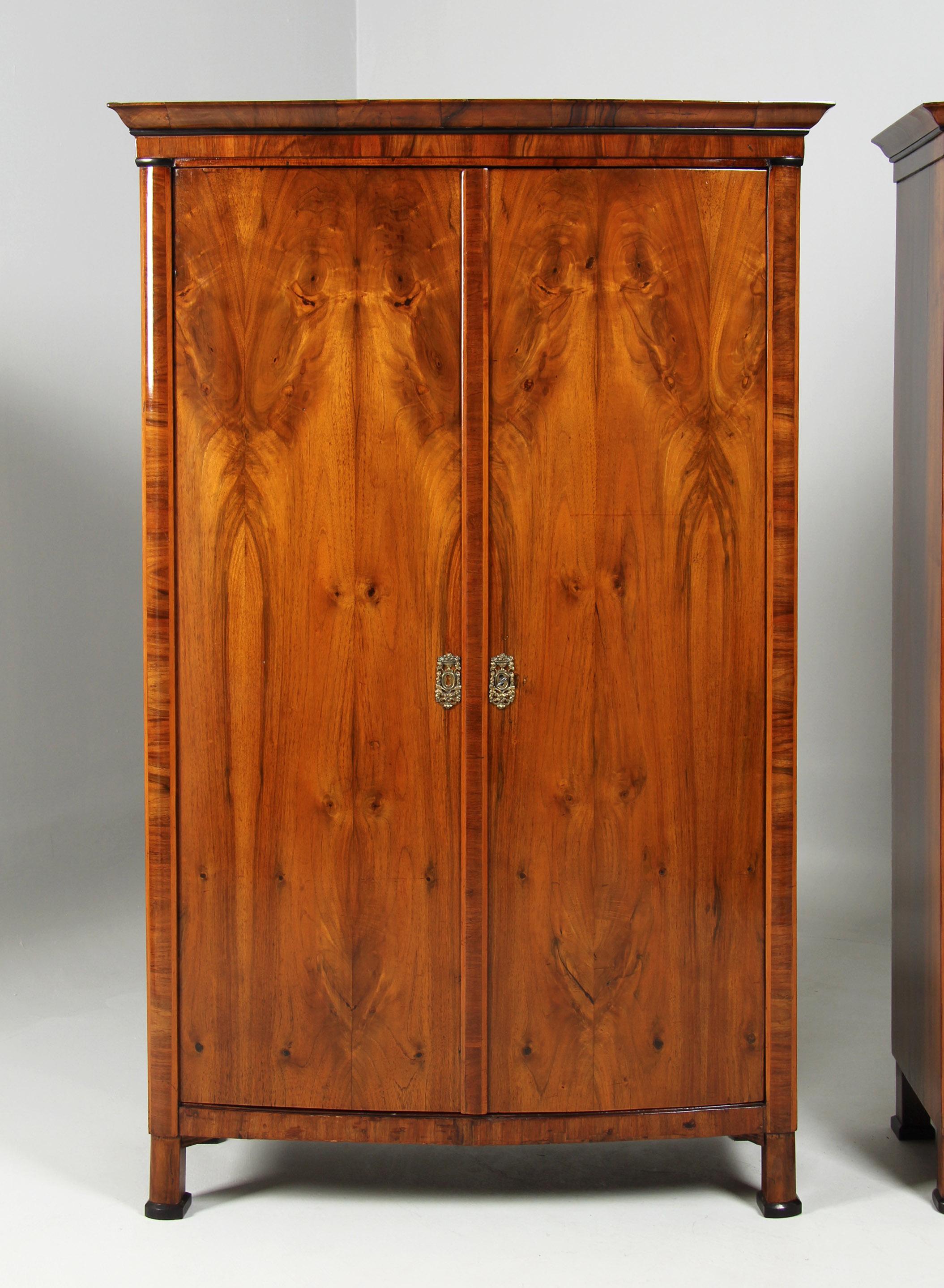 Rare pair - two identical Biedermeier cabinets

Austria
Walnut
Biedermeier around 1835

Dimensions: H x W x D: 177 x 111 x 54 cm

Description:
Extremely rare pair of two matching Biedermeier cabinets.

Two-door cabinets with discreetly curved fronts