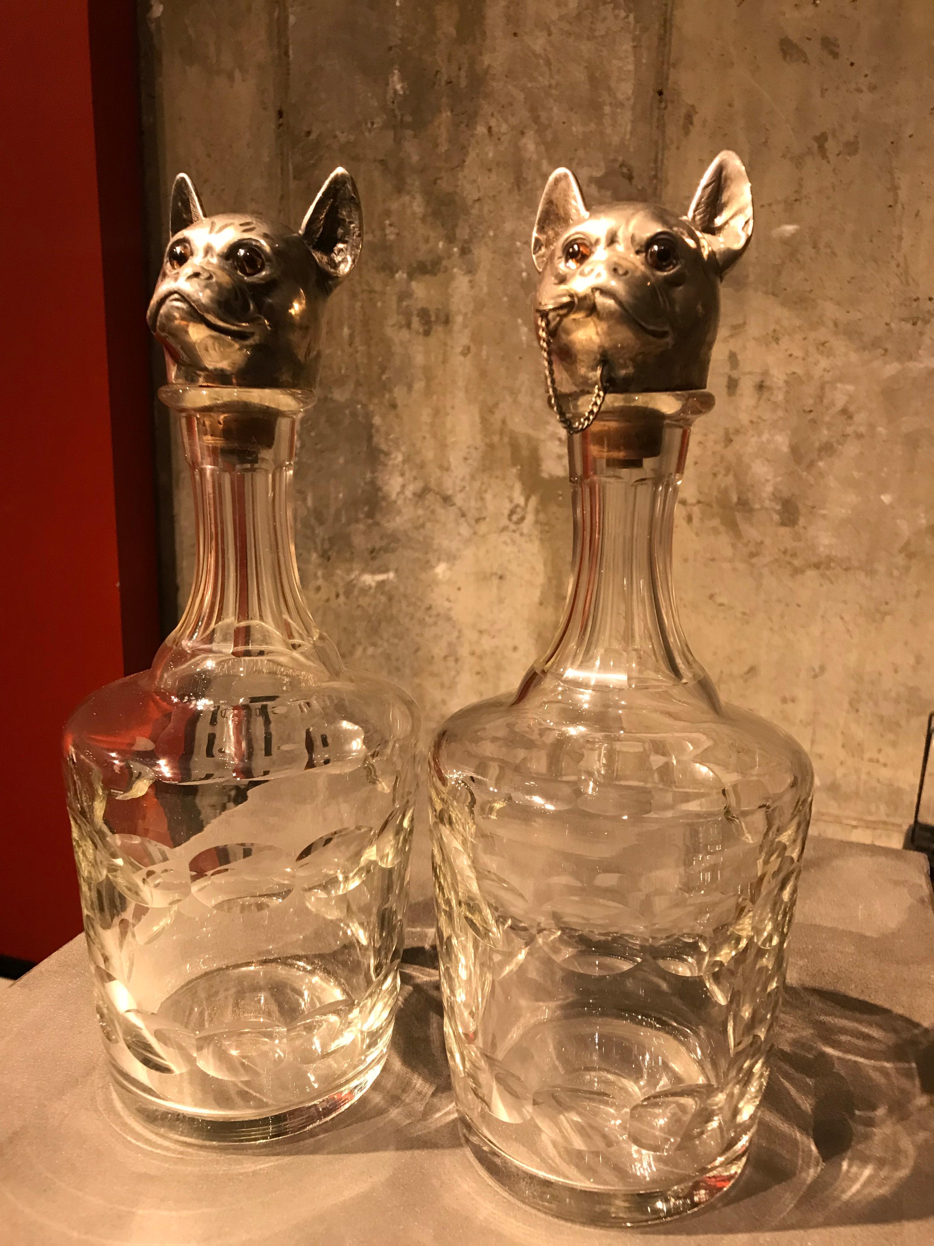 These Austrian decanters are in fantastic condition, and very rare to find a matching pair. Each dog head retains it's original cut glass body and glass eyes.