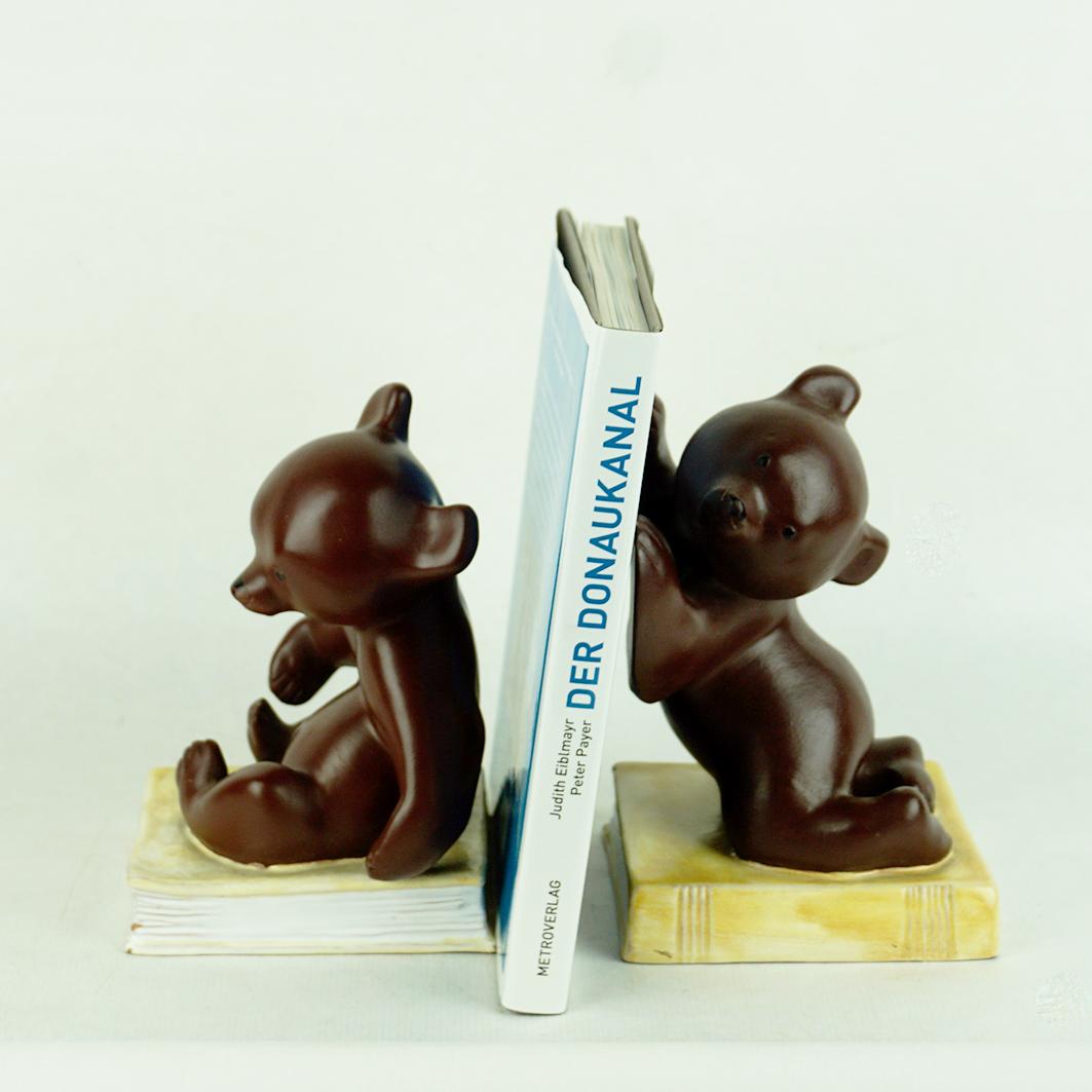 This charming Bear ceramic bookends have been designed and manufactured by the Viennese midcentury artist Leopold Anzengruber. Born in 1912 he founded his own company Anzengruber Keramik Wien in 1949 where he created his rich oeuvre, very well known