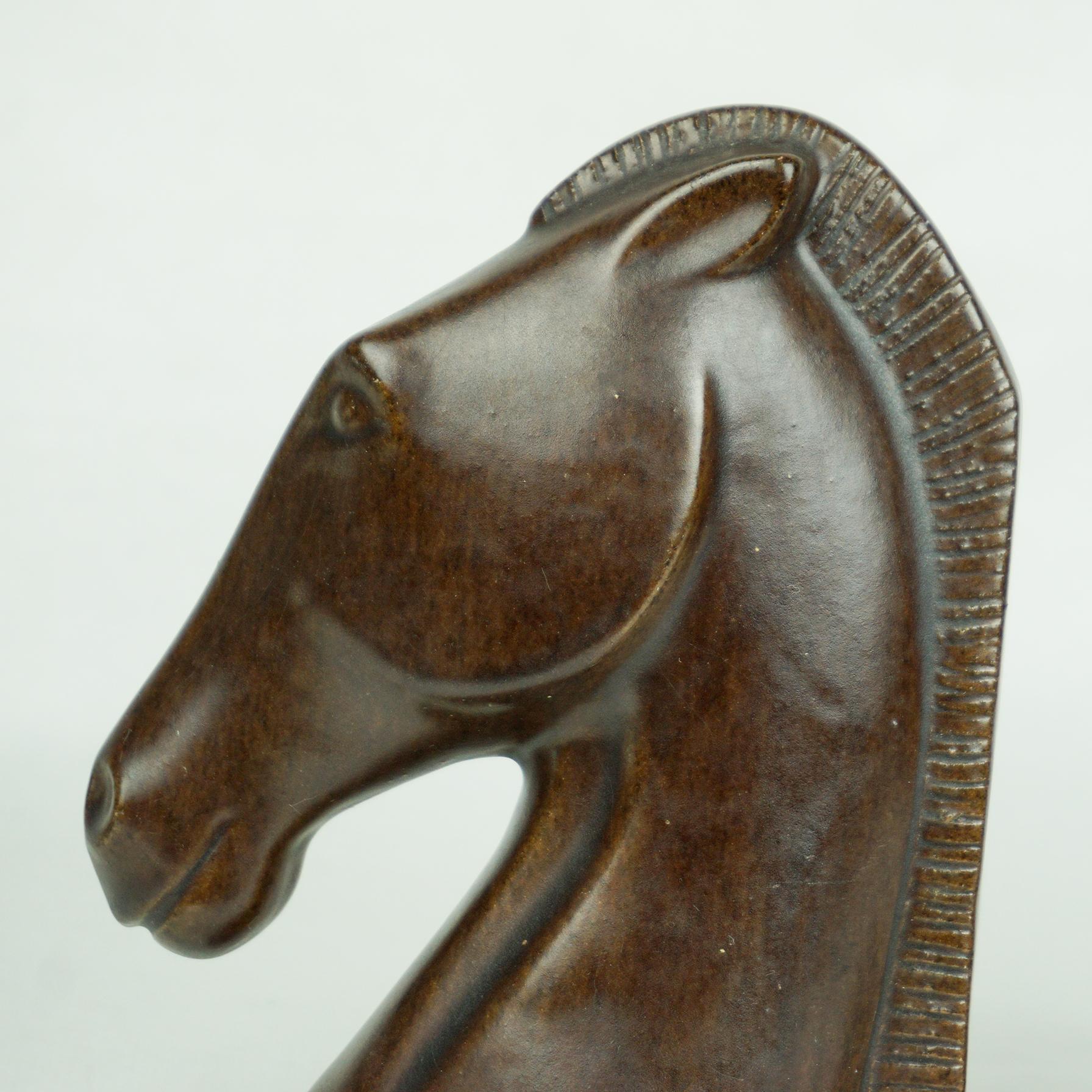 This charming Horse ceramic bookends have been designed and manufactured by the Viennese midcentury artist Leopold Anzengruber. Born in 1912 he founded his own company Anzengruber Keramik Wien in 1949 where he created his rich oeuvre, very well