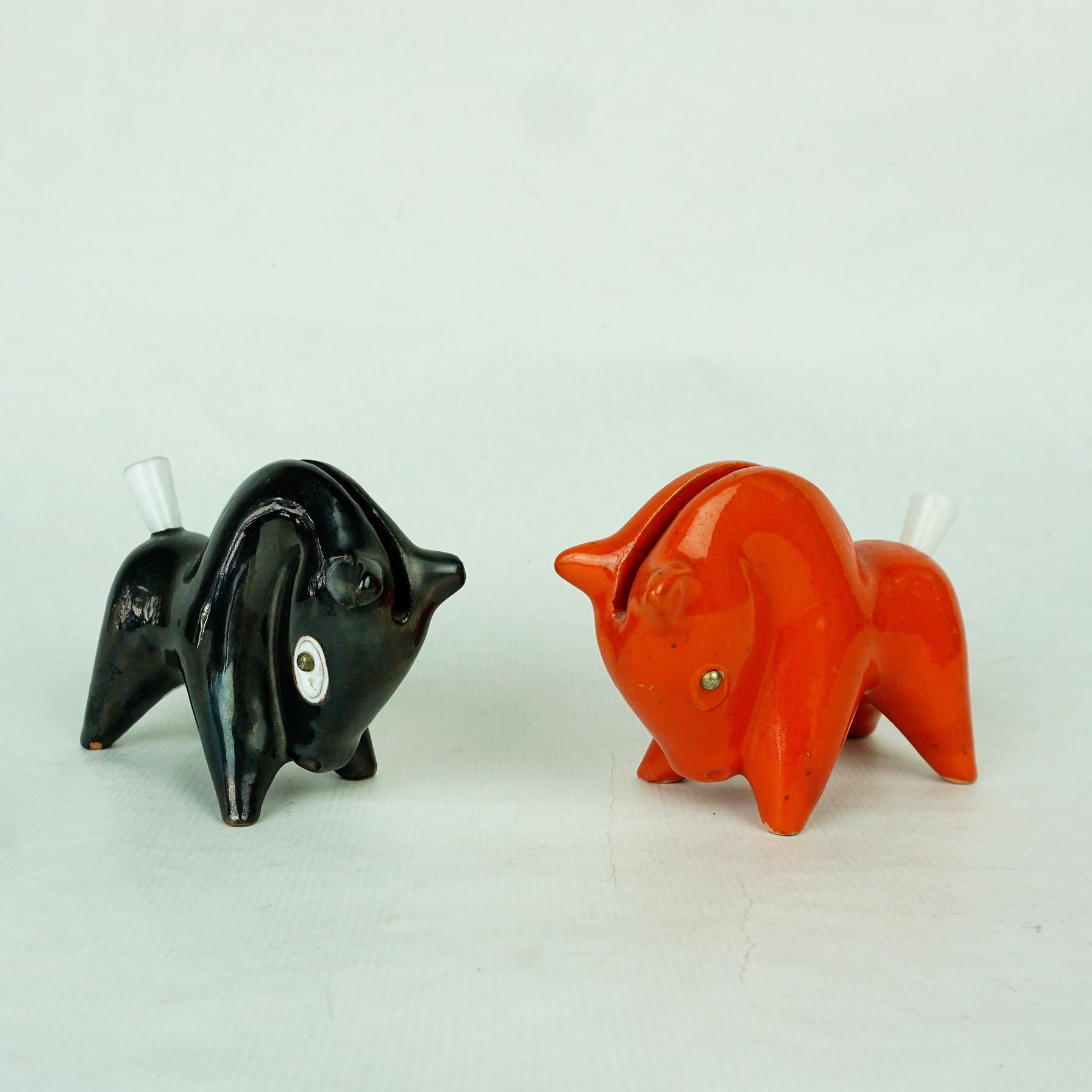 Amazing black and red glazed small horse ceramic sculptures designed and executed by the Austrian Artist Leopold Anzengruber, Mod. no 137 in the 1950s. They were made to be used at the table as toothpick holders. Both are in very good condition, the