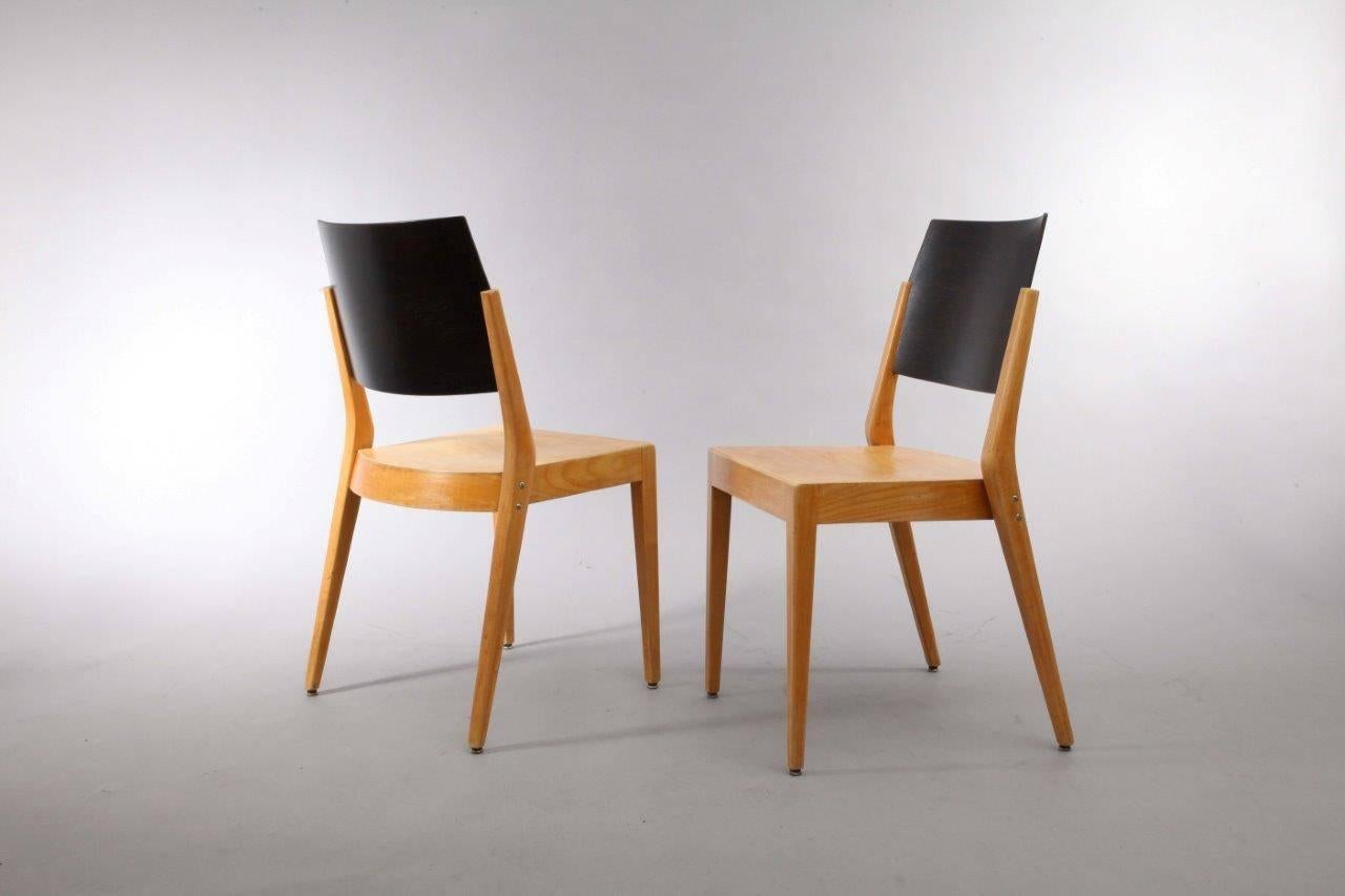 A rare set of two-tone Viennese stacking chairs designed by Austrian architect Prof. Karl Schwanzer and manufactured by Thonet in the 1950s.
This chair was designed by Karl Schwanzer for the Werkbundausstellung in the 