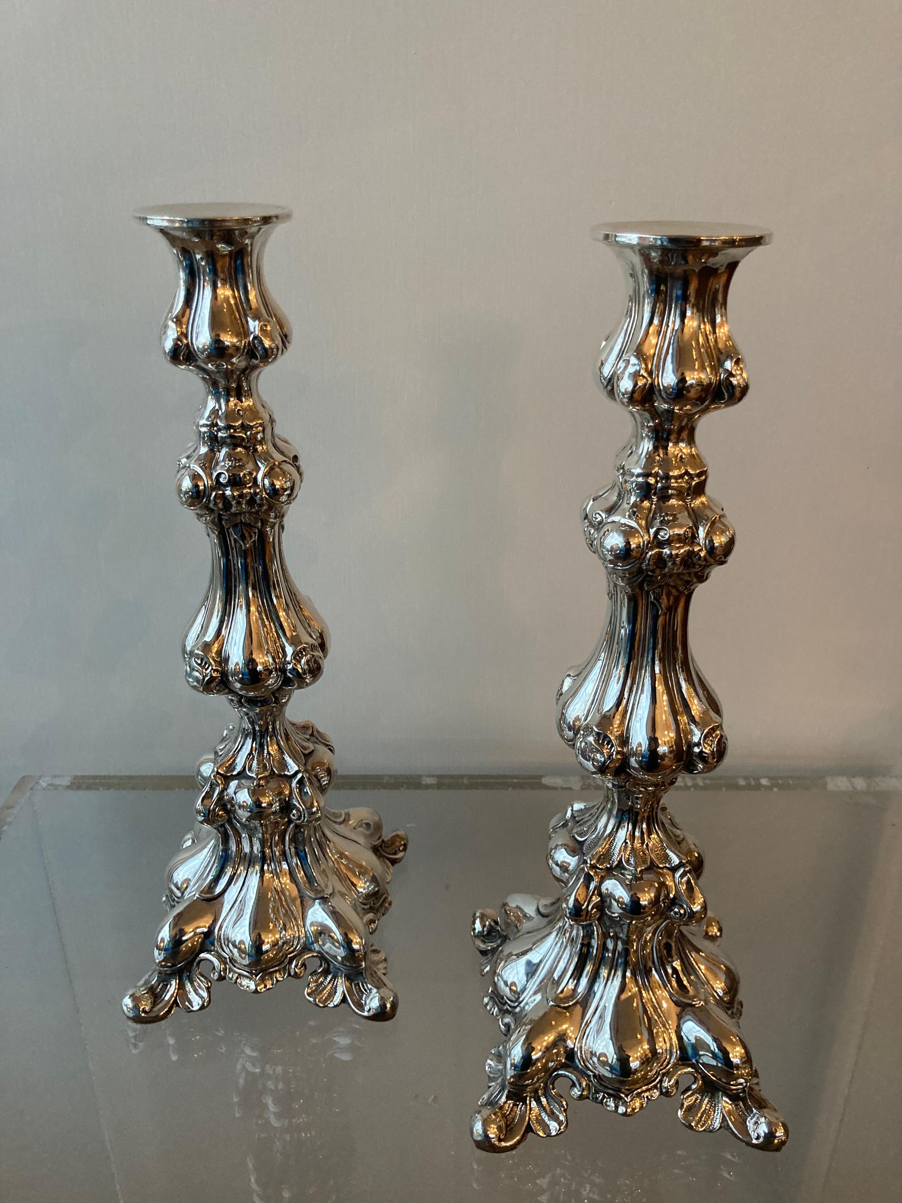 Beautiful pair of Austrian Baroque sterling candlesticks..... in great condition.