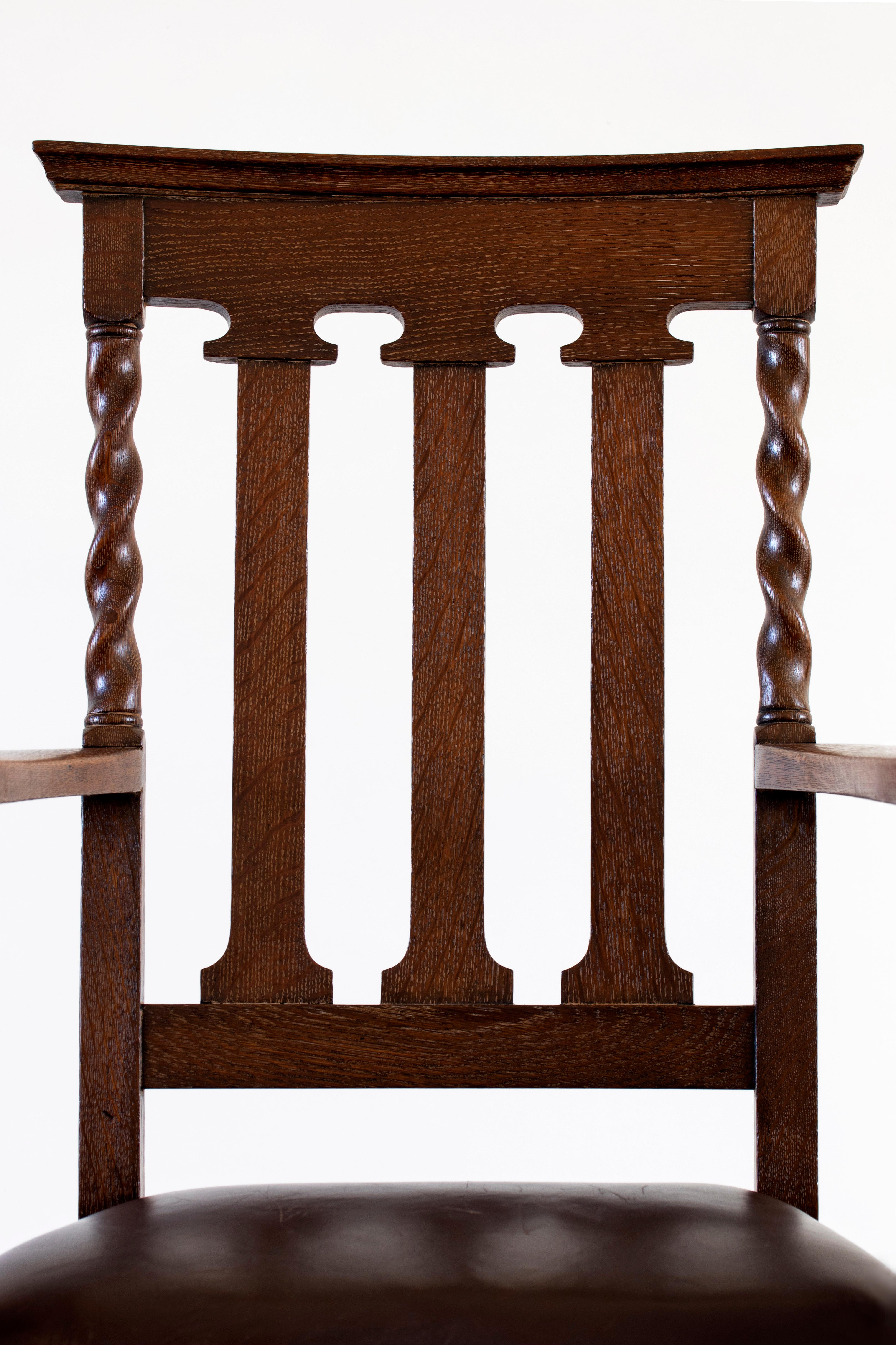 20th Century Pair of Austro-Croatian Large Carved Oak and Leather Jugendstil Armchairs