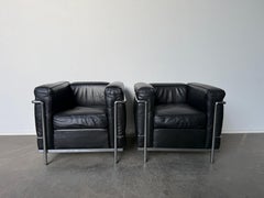 Pair of Authentic Black leather Chrome lounge chairs Le Corbusier LC2 by Cassina