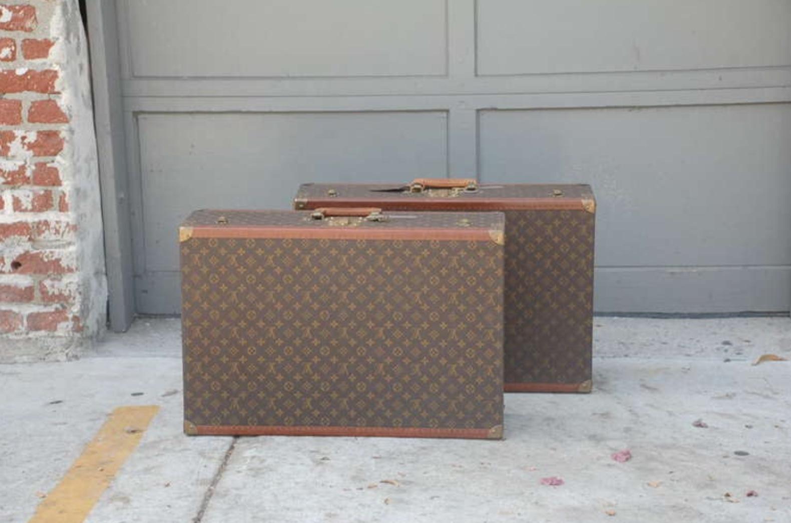 Pair of Authentic Louis Vuitton Luggage pieces. 

Individually numbered, Pair of brass numbered keys included with both pieces.

Can be mounted as side tables / night stands.