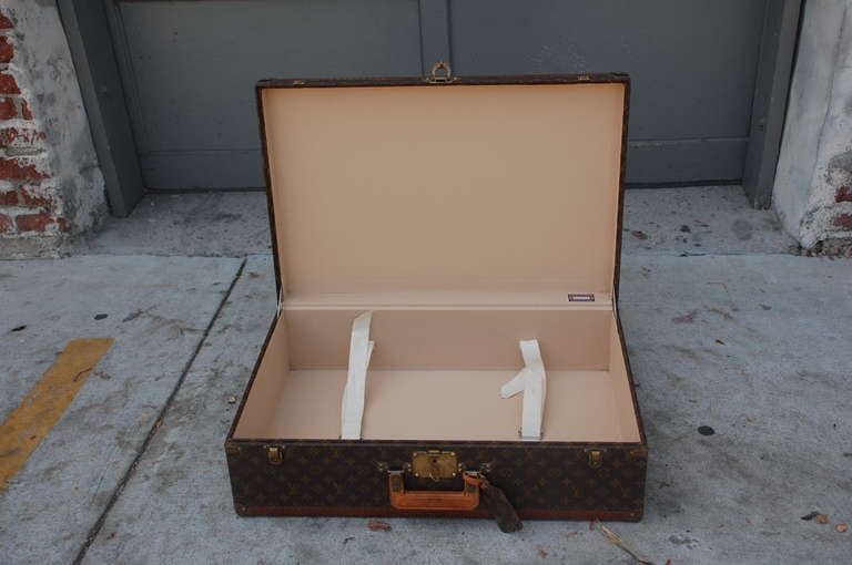 Brass Pair of Authentic Louis Vuitton Luggage Pieces For Sale