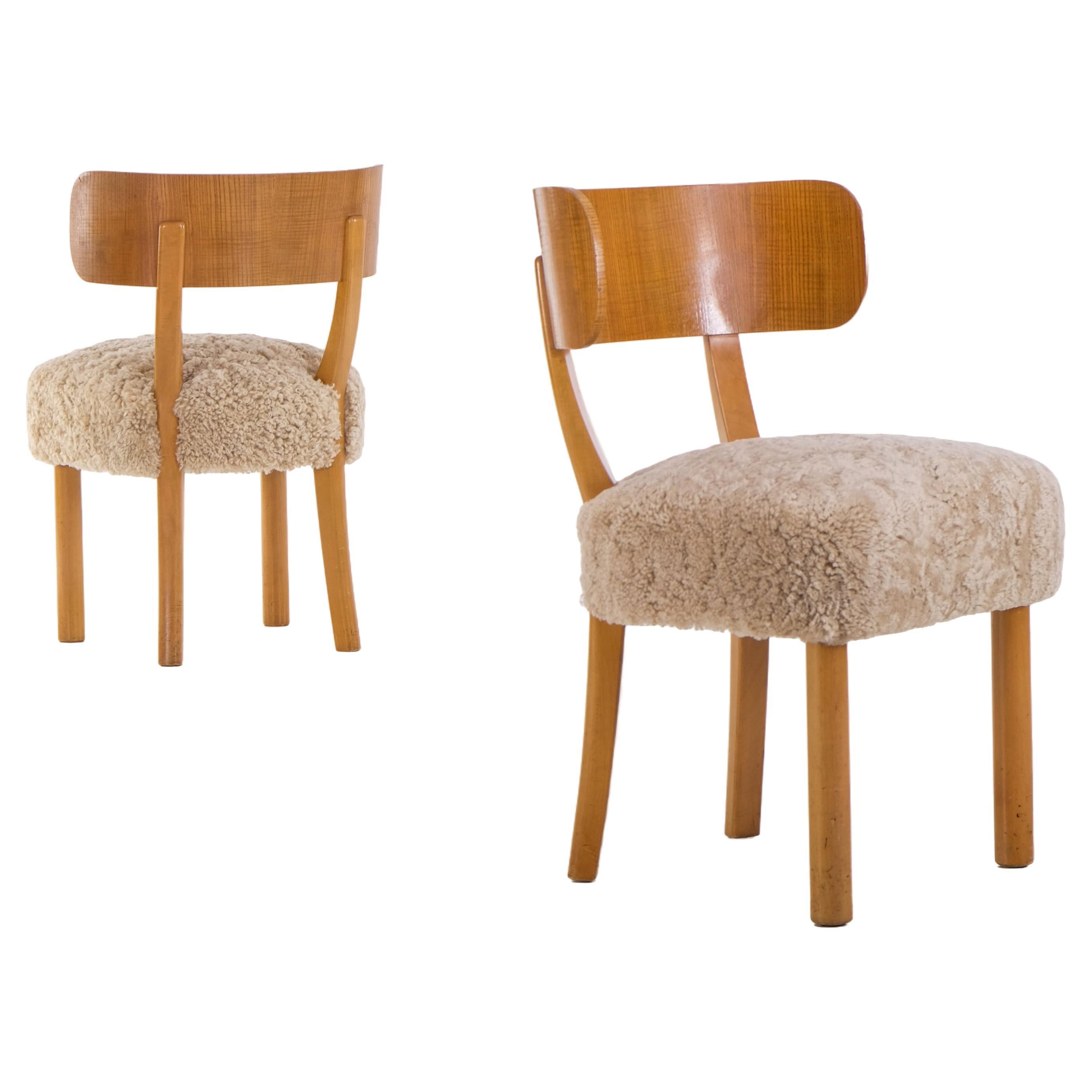 Pair of Axel-Einar Hjorth "Birka" chairs by Nordiska Kompaniet, 1930s For Sale