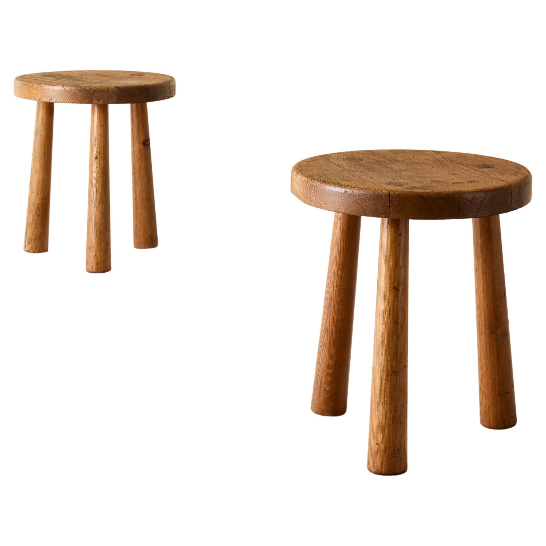 Pair of Axel-Einar Hjorth "Skoga" stools / side tables by NK, Sweden, 1930s