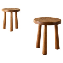 Pair of Axel-Einar Hjorth "Skoga" stools / side tables by NK, Sweden, 1930s