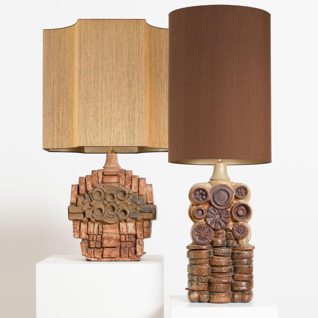 A rare pair of ceramic table lamps by Bernard Rooke, England, 1960s. Sculptural pieces, made of handmade ceramic elements in natural tones of terracotta and stone, with a combination of dry and glazed finishes. With special custom made lamp shades