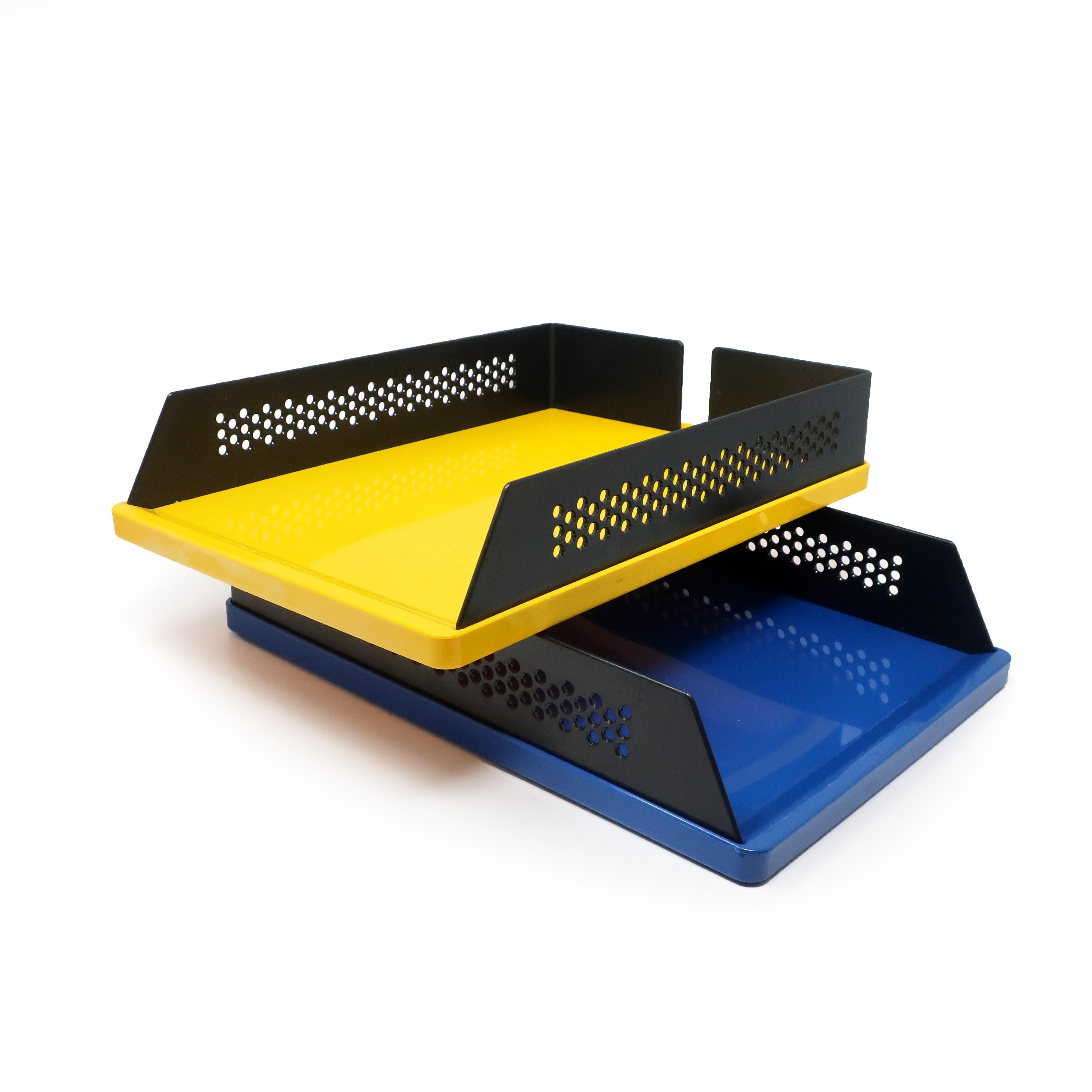 A pair of stylish, stackable blue and yellow plastic letter trays with black accents designed by Raul Barbieri and Giorgio Marianelli for Rexite in 1980. The Babele 940 is 1980s Italian postmodern design at its finest, plus they are stackable and