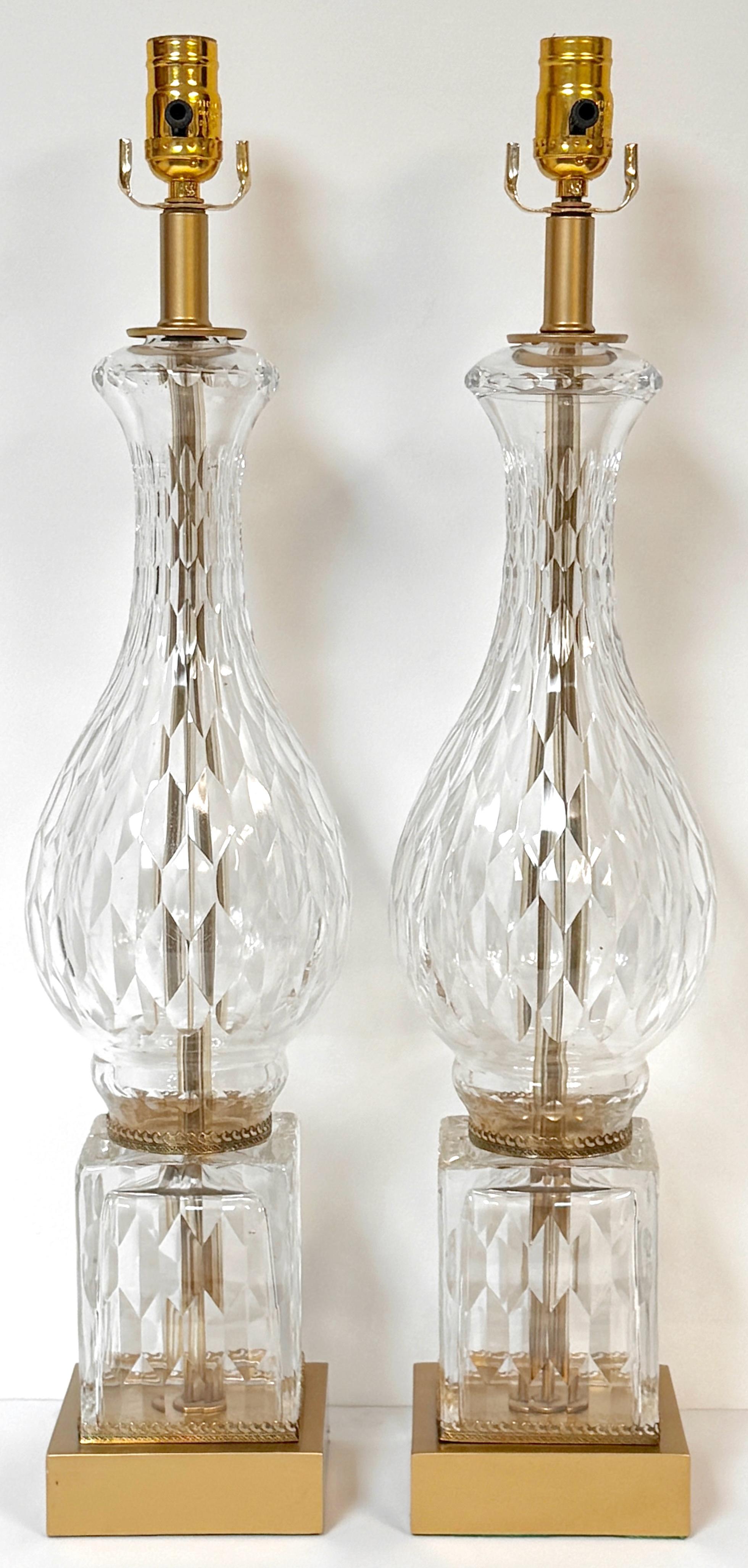 Pair of Baccarat (Attributed) Crystal Baluster Column Lamps—France, Circa 1950s

This exquisite pair of Baccarat-attributed crystal baluster column lamps showcases the timeless sophistication of mid-century Neoclassical French design. Made from