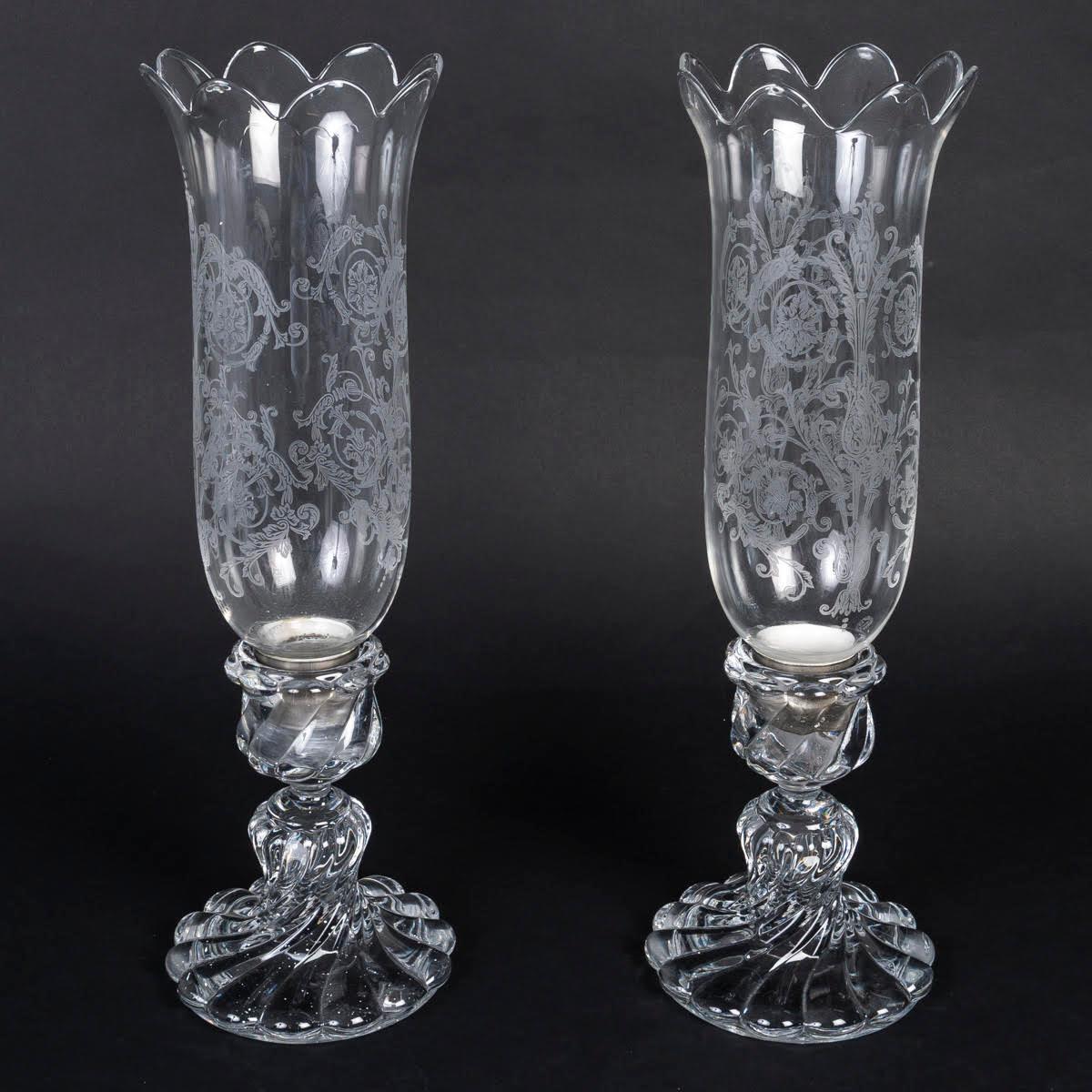 Pair of Baccarat crystal candle holders, early 20th century, Napoleon III style.

Pair of Baccarat crystal candle holders in the Napoleon III style, 19th century.
H: 41cm, D: 12.5cm
