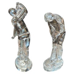 Coppia di statuine di golfisti in cristallo di Baccarat