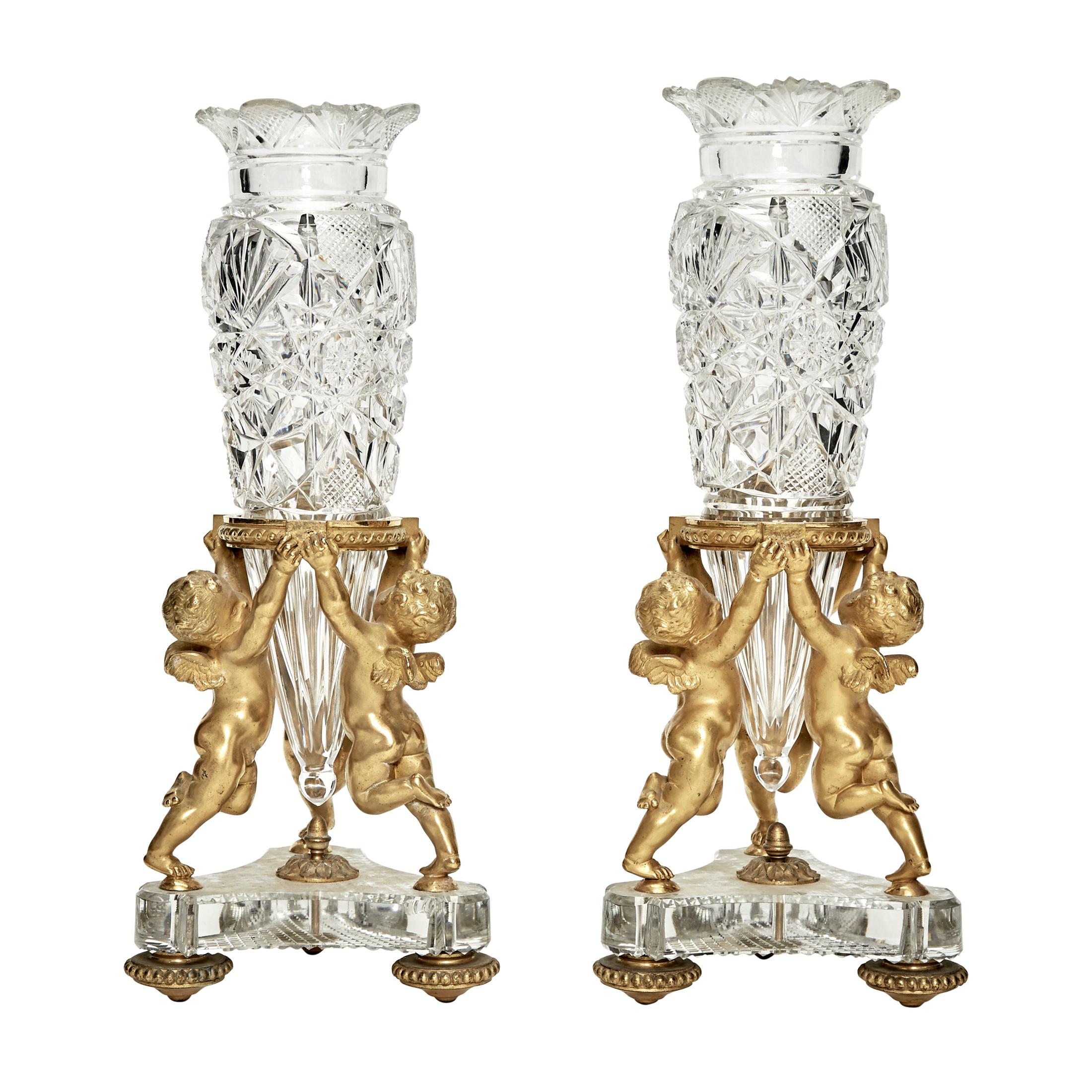 Fine quality pair of Baccarat gilt-bronze mounted cut glass figural vases. Signed under base.

Maker: Baccarat
Origin: French
Date: 19th century
Dimension: 13 3/8 in. x 5 1/2 in.