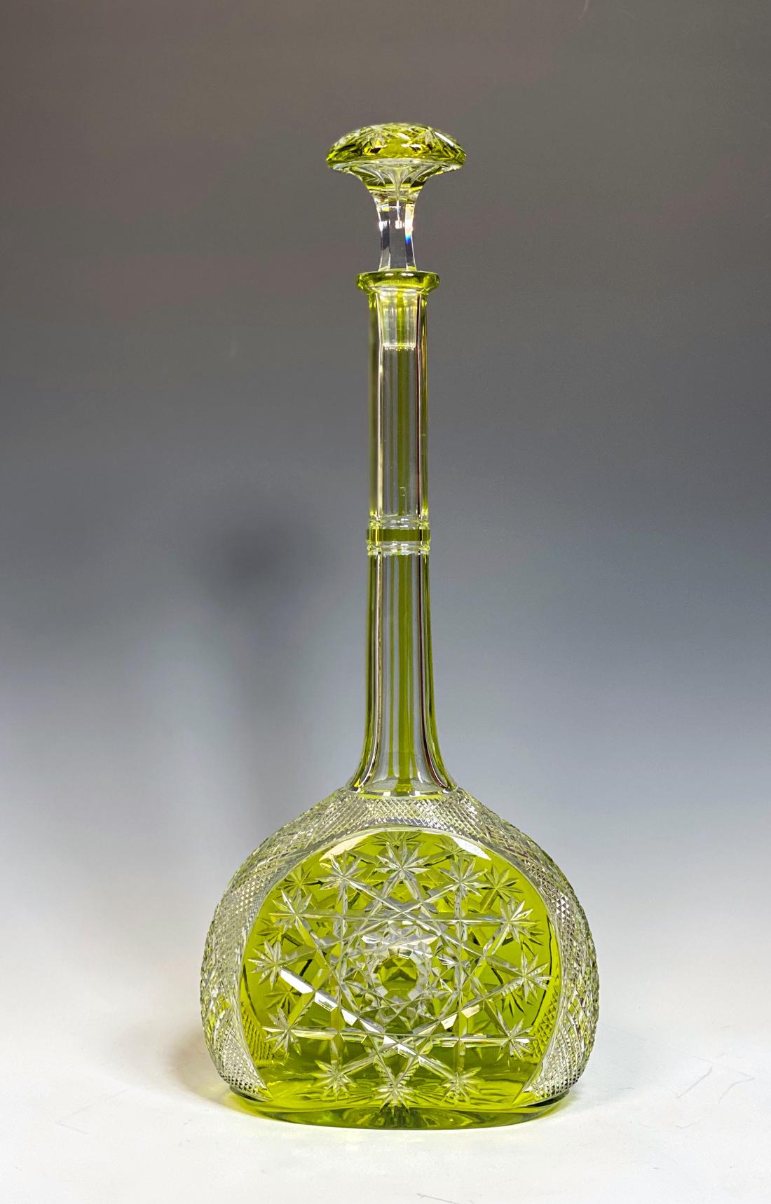An amazing and rare pair of matched decanters with Chartreuse overlay and cut to clear in the intricate and complex 
