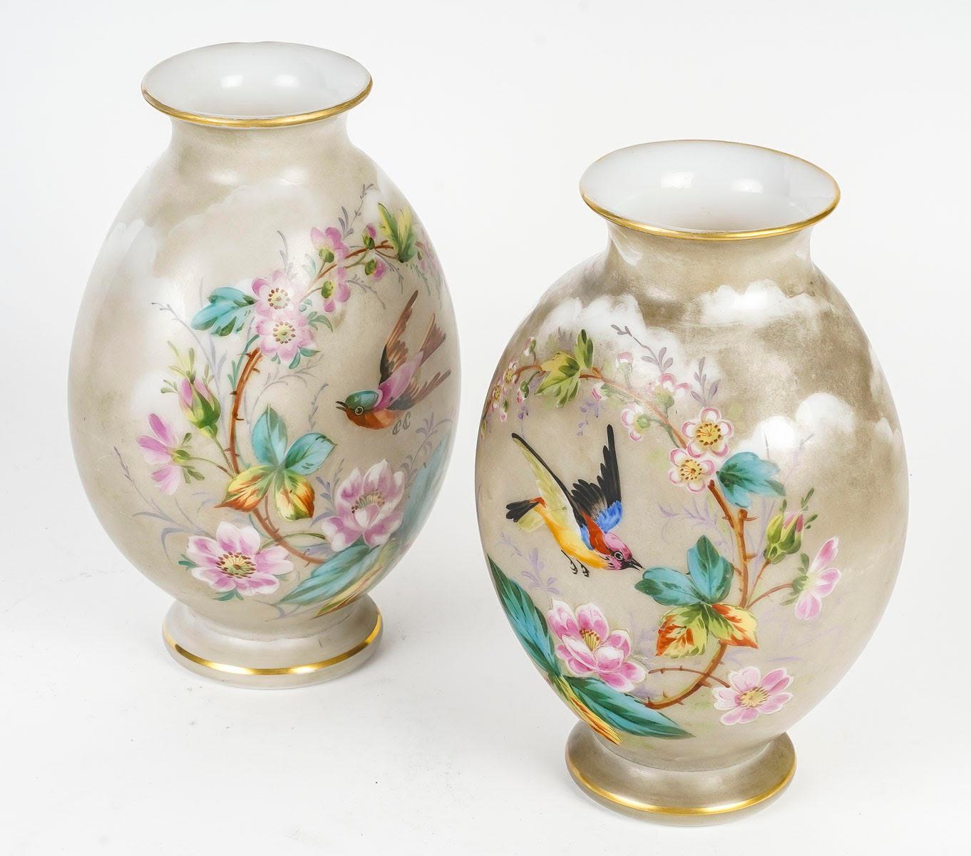 Pair of Baccarat Painted Opaline Vases, Birds and flowers design, 19th Century, Napoleon III period.

A pair of 19th century Baccarat painted opaline vases with bird and flower decorations, Napoleon III period.
h: 24cm, w: 16cm, d: 12cm