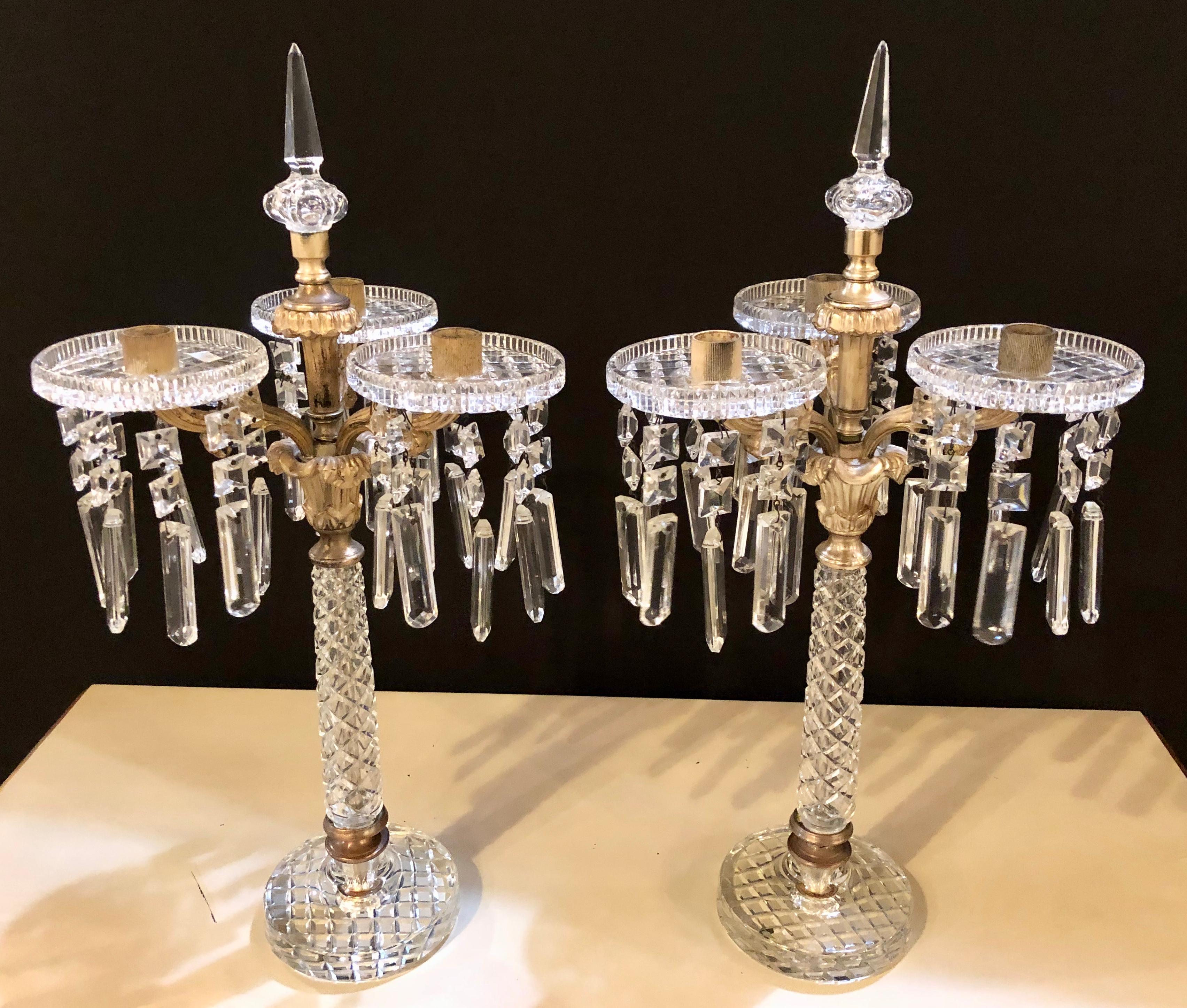 Pair of Baccarat style crystal three-arm candelabras the pair of fine cut quality.
IEH.