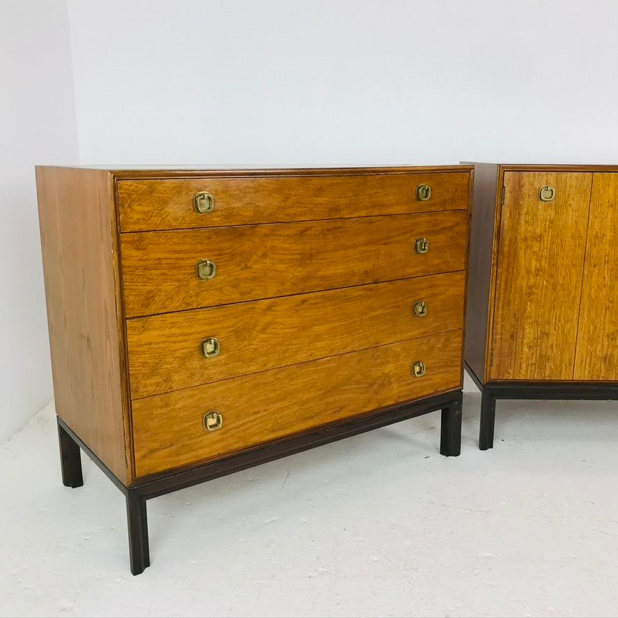 Handsome pair of bachelor chests by Edward Wormley for Dunbar. Original condition with some surface scratches/marks. Brass pulls.
    