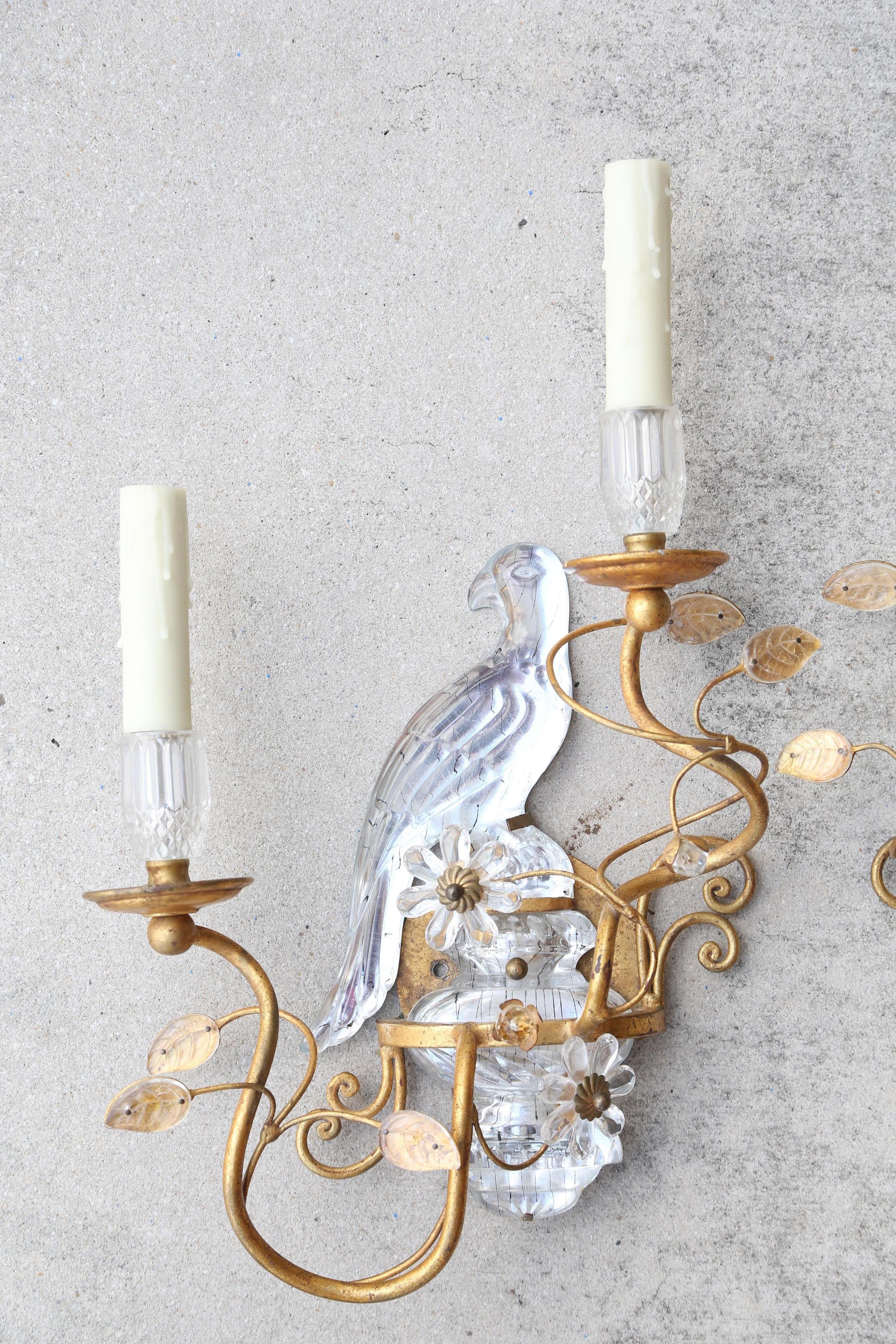 Pair of vintage rock crystal bird sconces with gilded iron frame by Baguès.