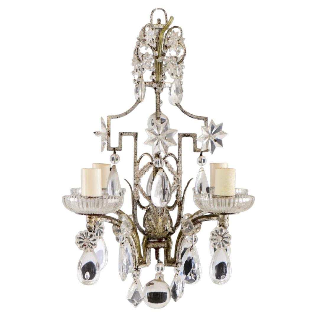 This is a fabulous and unusual pagoda form chandelier that has a beautiful crown with draped crystals and beading. Early 20th century Baquès style crystal & silvered metal four-light chandelier. Beautiful star and flower shaped crystals with hanging