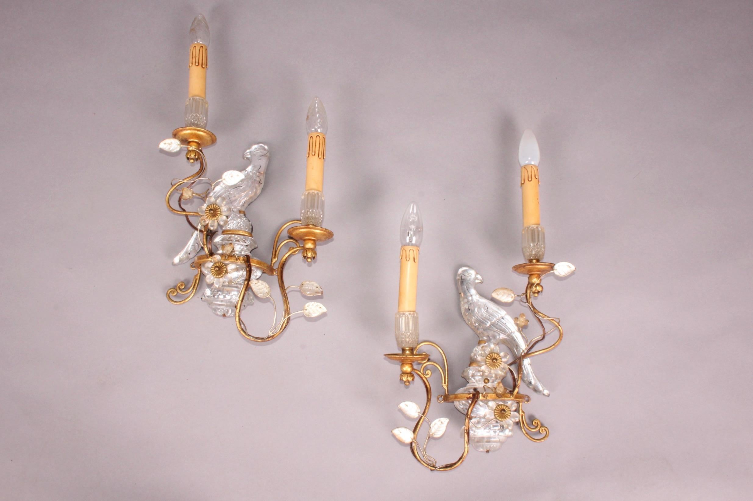 Pair of parrot wall sconces, some small piece of glass is missing on the flower see the photo.