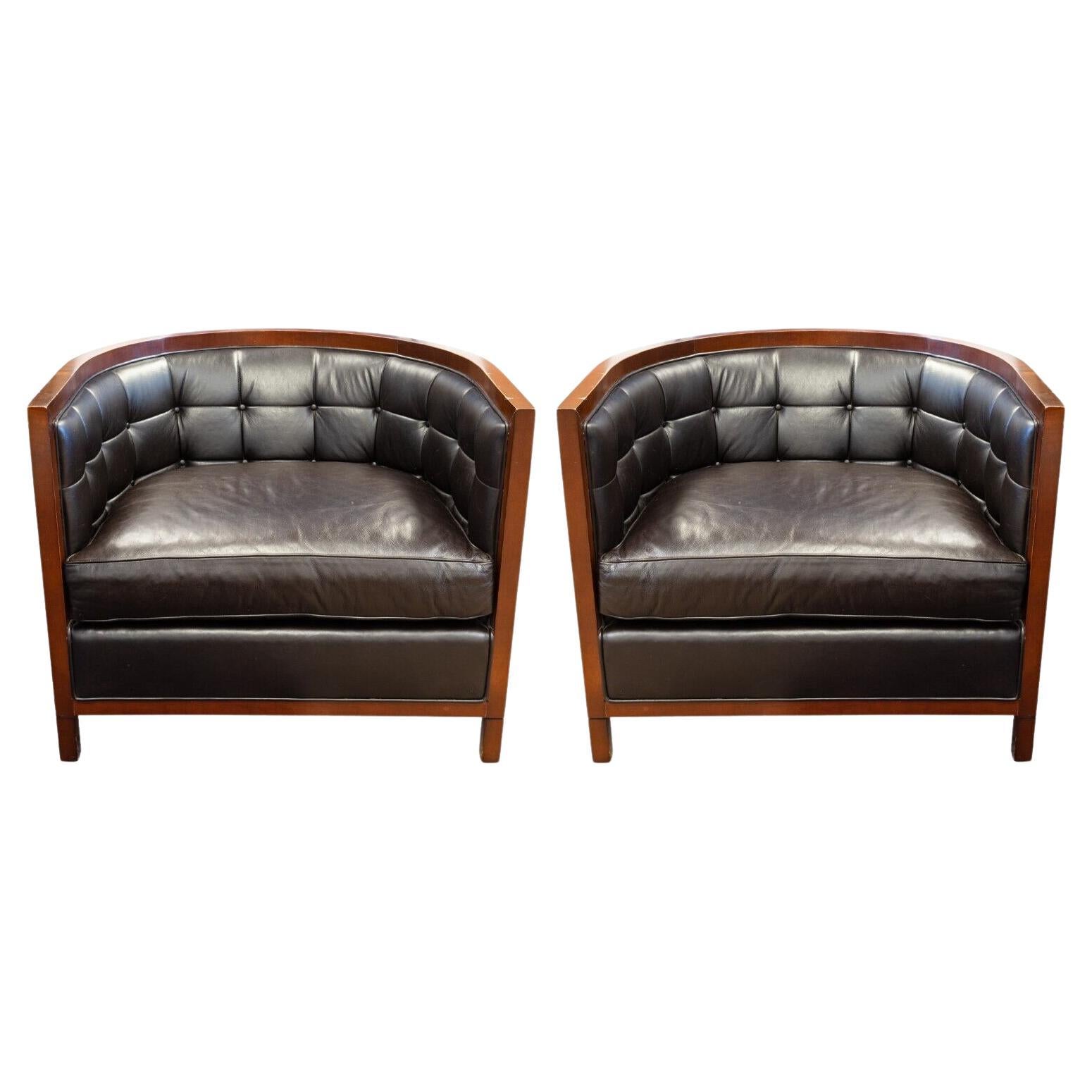 Pair of Baker Black Leather Tufted Curved Tub Chairs with Wood Trim