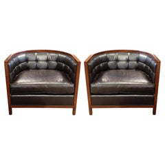 Pair of Baker Black Leather Tufted Curved Tub Chairs with Wood Trim