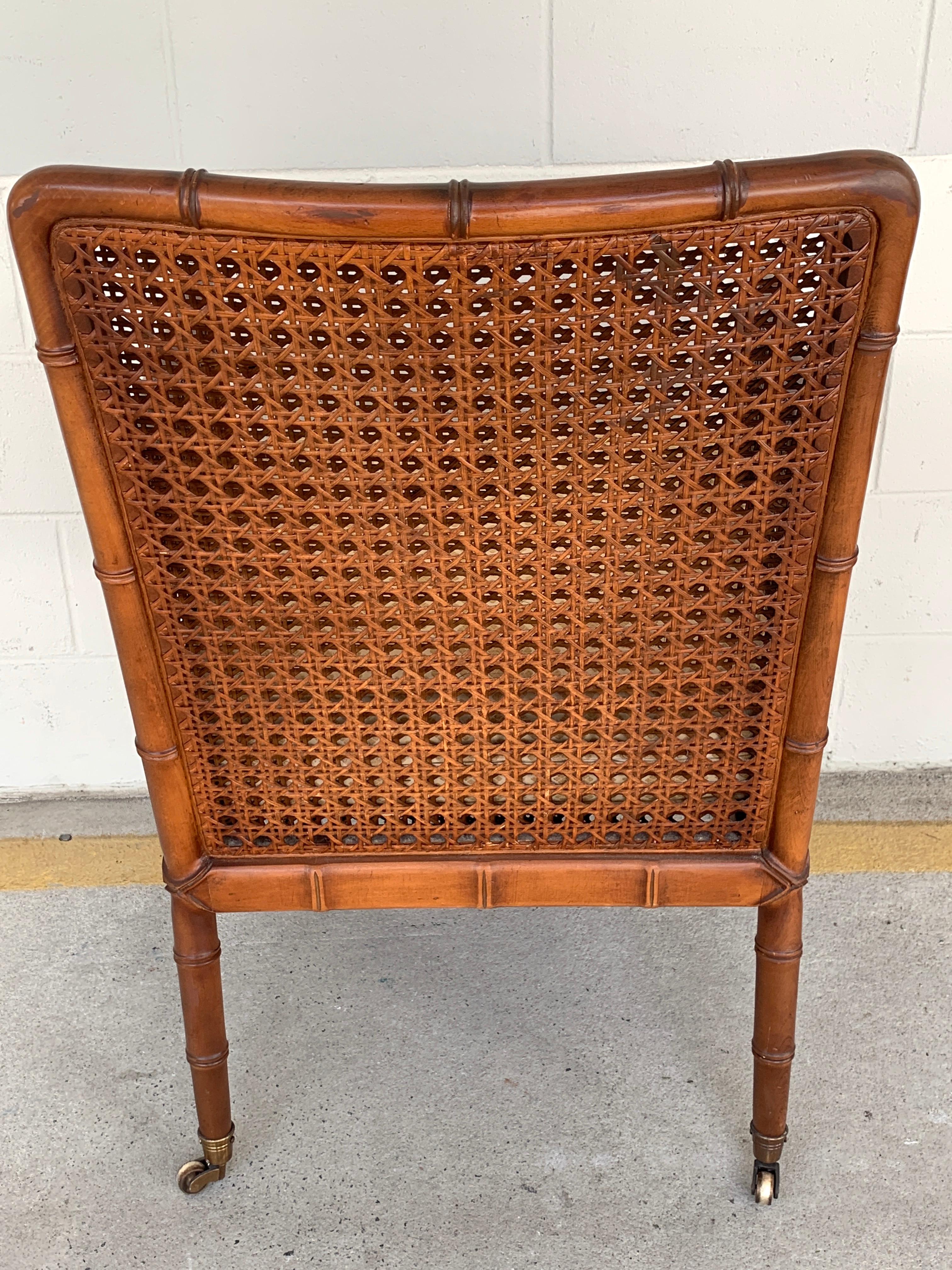 Cane Pair of Baker Campaign Style Chairs, with Faux Bamboo Detail
