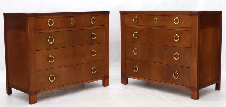 Pair of decorative Mid-Century Modern neoclassical bachelor entry chests dressers with heavy brass ring pulls by Baker.