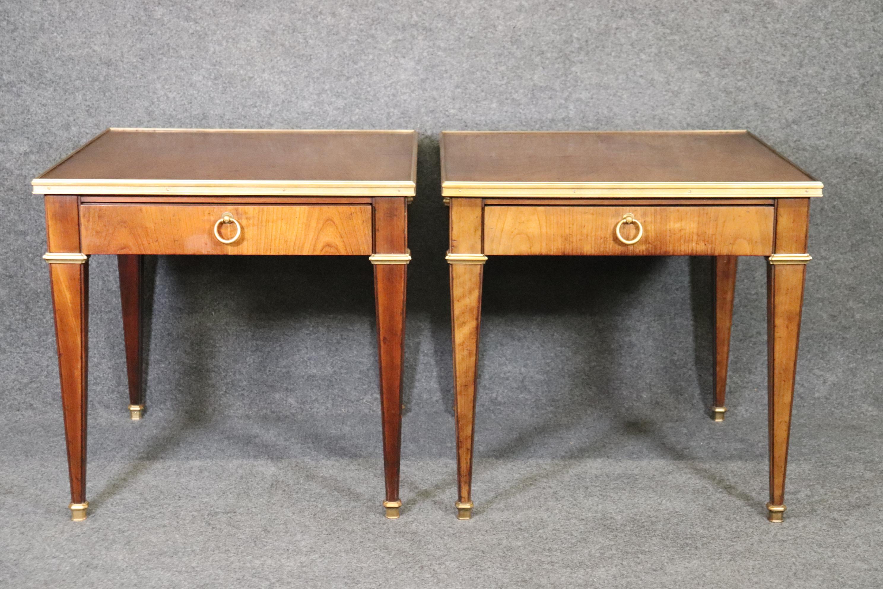 Dimensions- H: 23.25in W: 24.25in D: 27.25in
This is an exceptional pair of Directoire Style baker side tables, end tables. they are equipped with brass hardware and are made from the highest of quality. Perfect for the ends of a sofa or next to