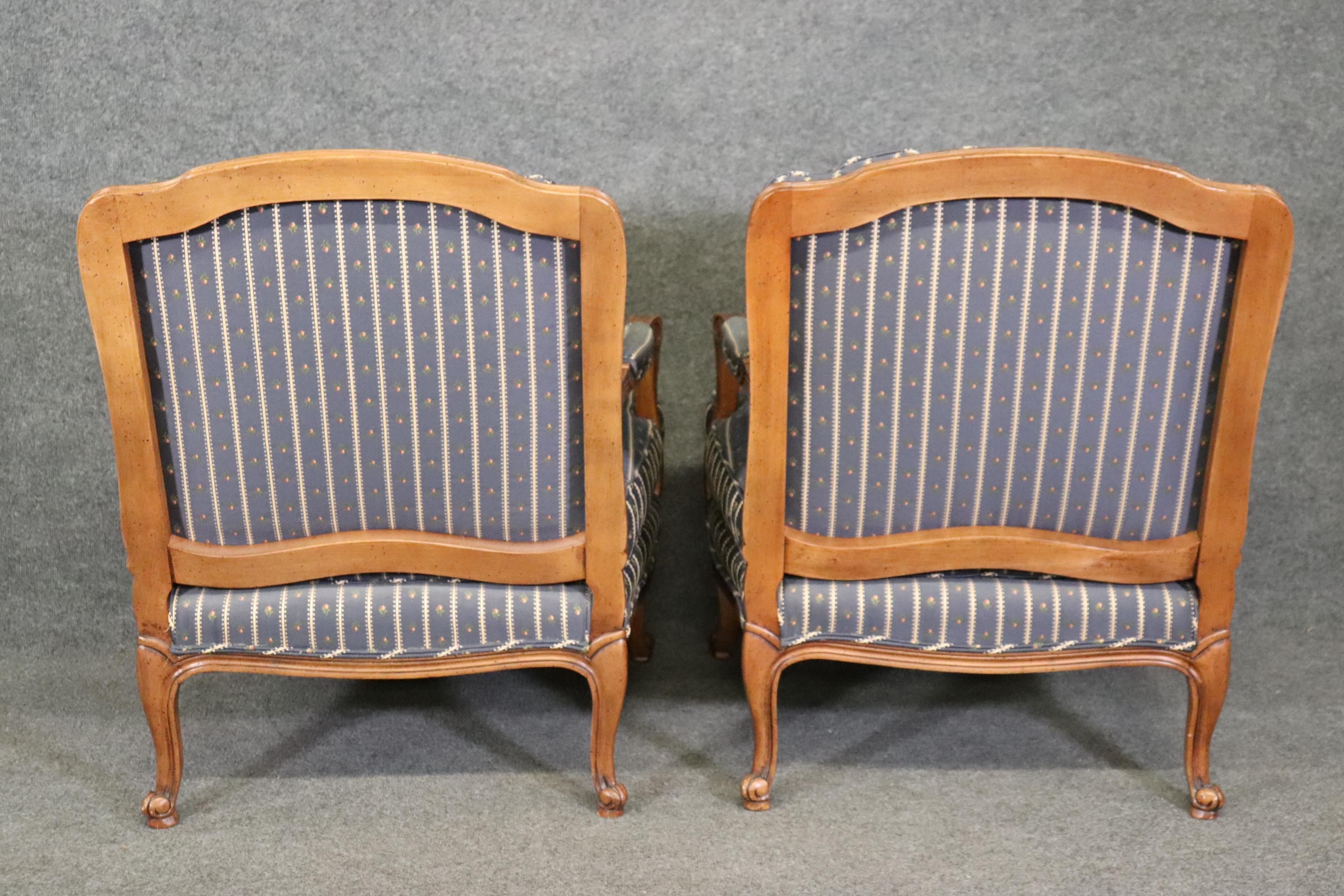 Late 20th Century Pair of Baker Furniture Company Walnut Open Arm Bergere Louis XV 