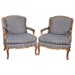 Pair of Baker Furniture Company Walnut Open Arm Bergere Louis XV