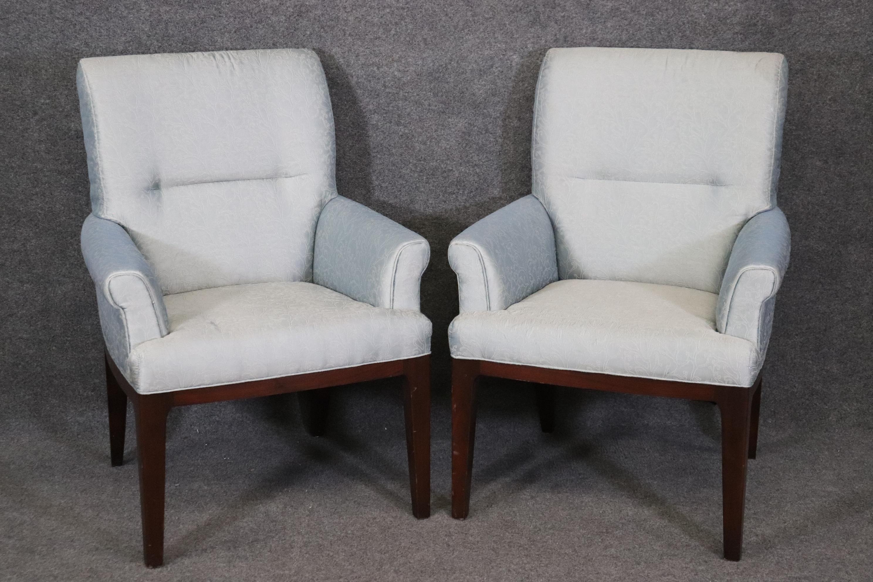Please note we have six of these. This is a beautiful pair of Baker solid mahogany mid century modern style club chairs or bergere chairs. They could also be used at the head of a dining table as neutral captain's chairs. The chairs are in good