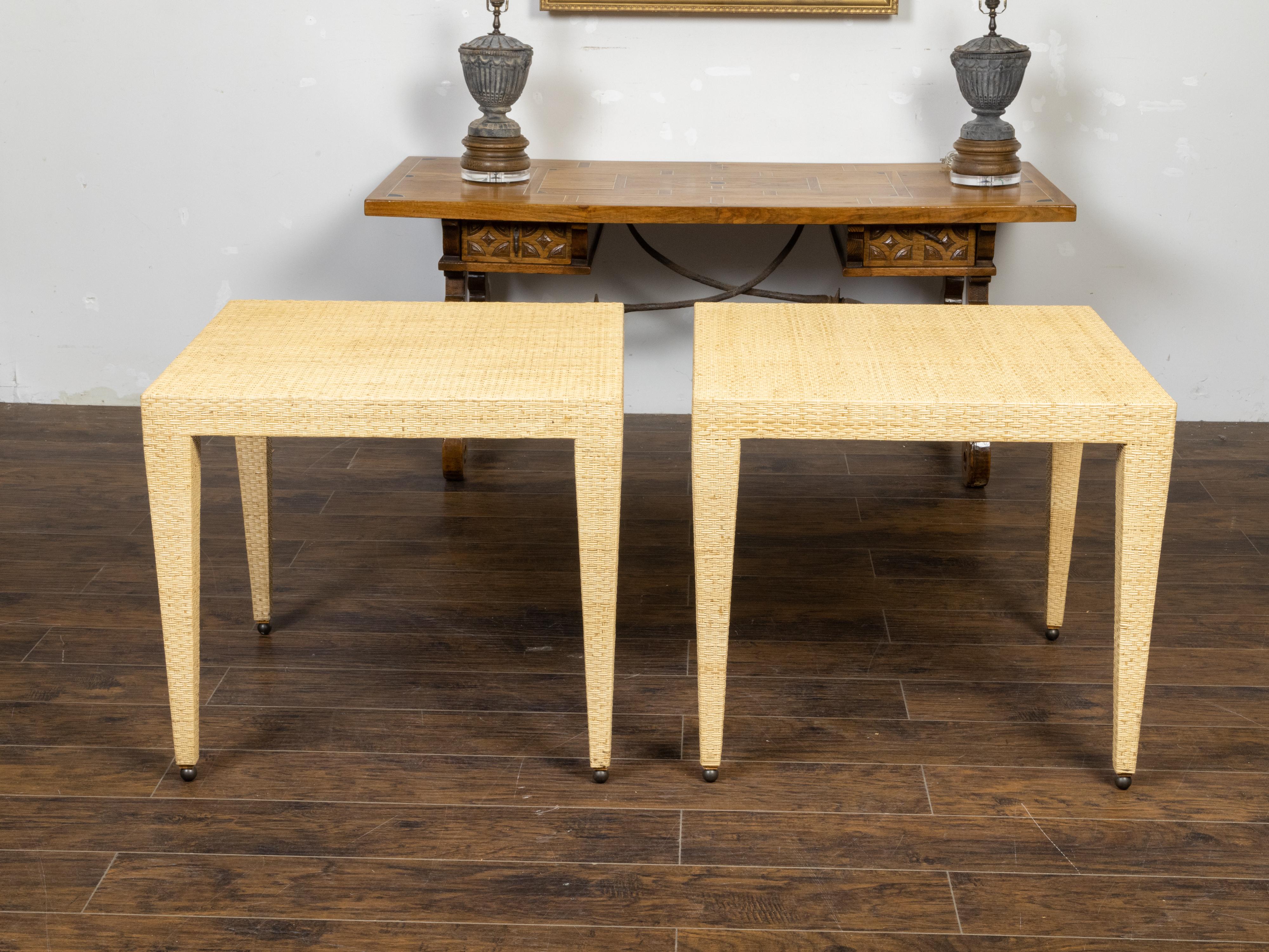 Pair of Baker Furniture Midcentury Wicker Side Tables with Tapered Legs In Good Condition For Sale In Atlanta, GA