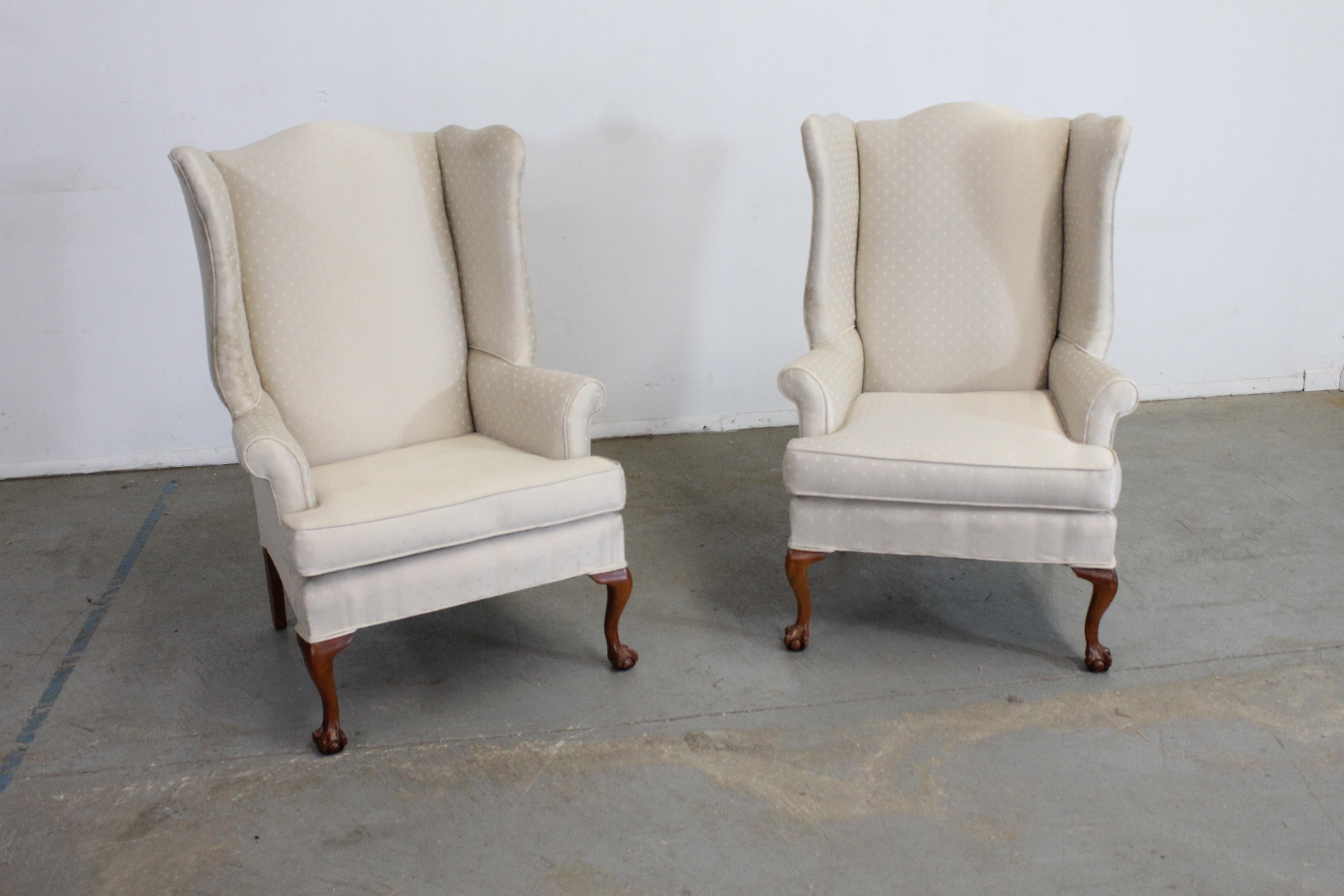 Pair of ball and claw fireside wingback chairs by Thomasville

Offered is a pair of ball and claw fireside wingback chairs by Thomasville. The chairs have a great look with nice lines, design, and look. The chairs are in good condition, but need