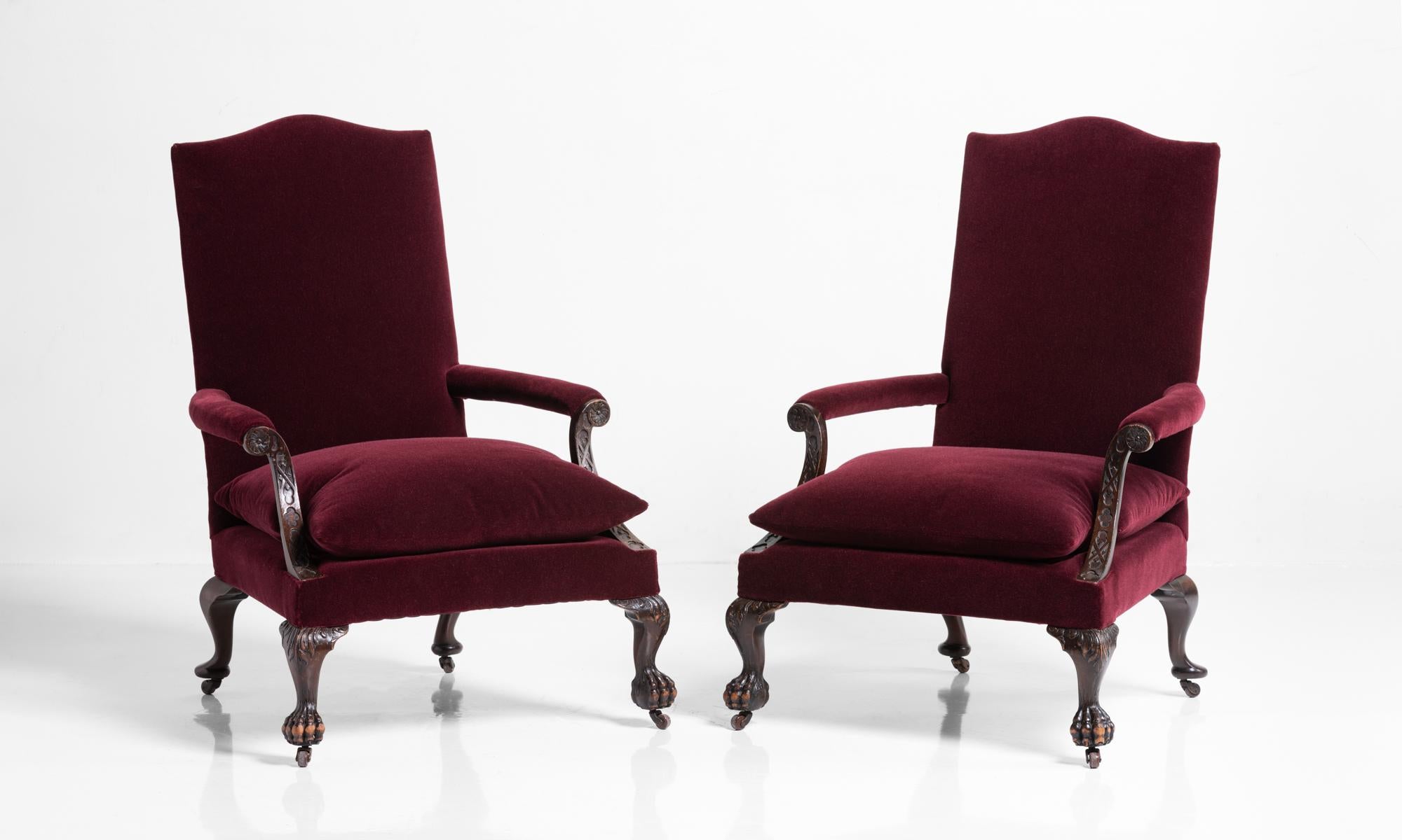 Pair of ball and claw armchairs, England, circa 1890.

Generously sized and newly upholstered in Maharam mohair alongside beautiful detailing on the arms and feet.