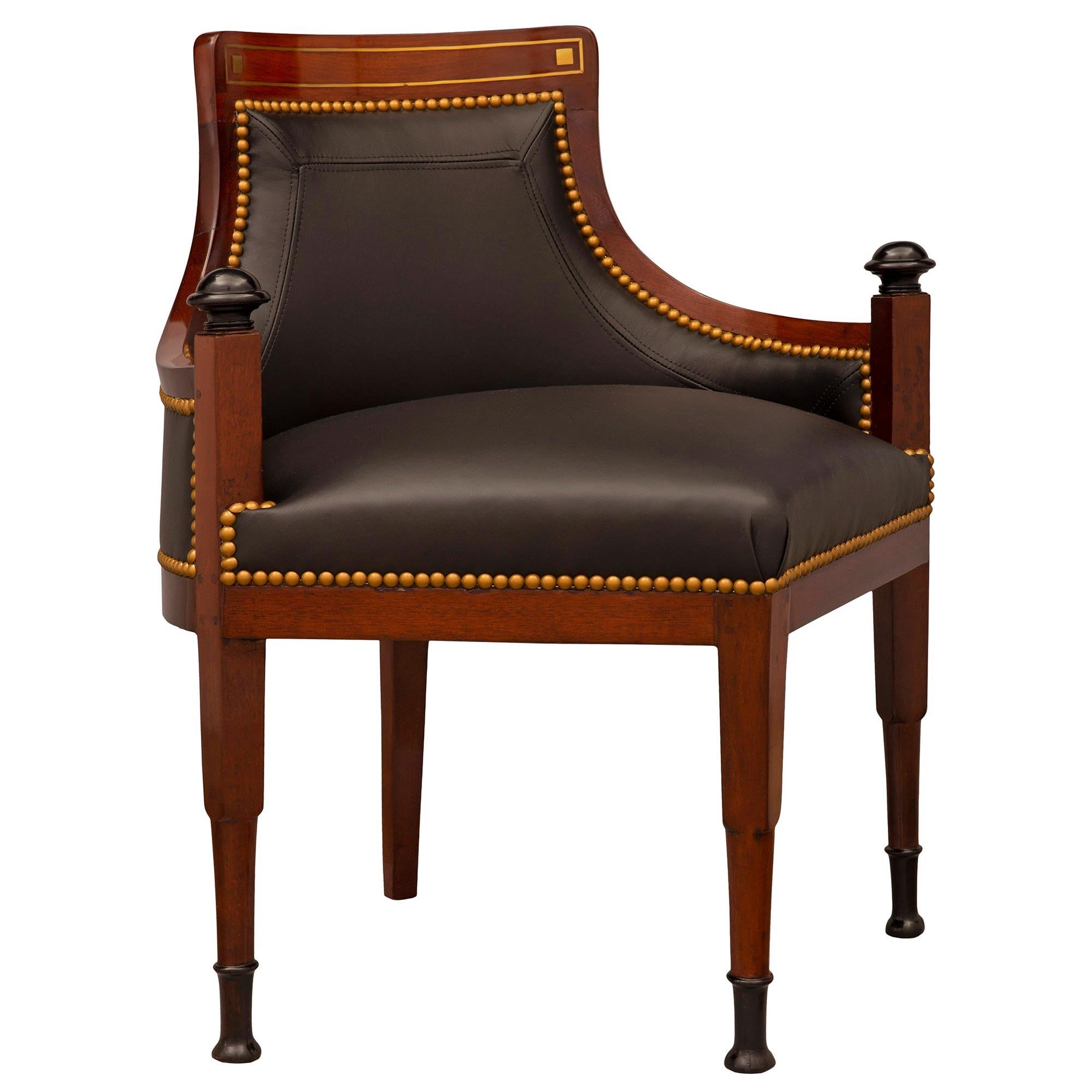 An exceptional and extremely unique pair of Baltic 19th century Neo-Classical st. Walnut, ebonized Fruitwood, and brass chairs. Each chair is raised by unique and most decorative square and circular Walnut legs with superb ebonized Fruitwood
