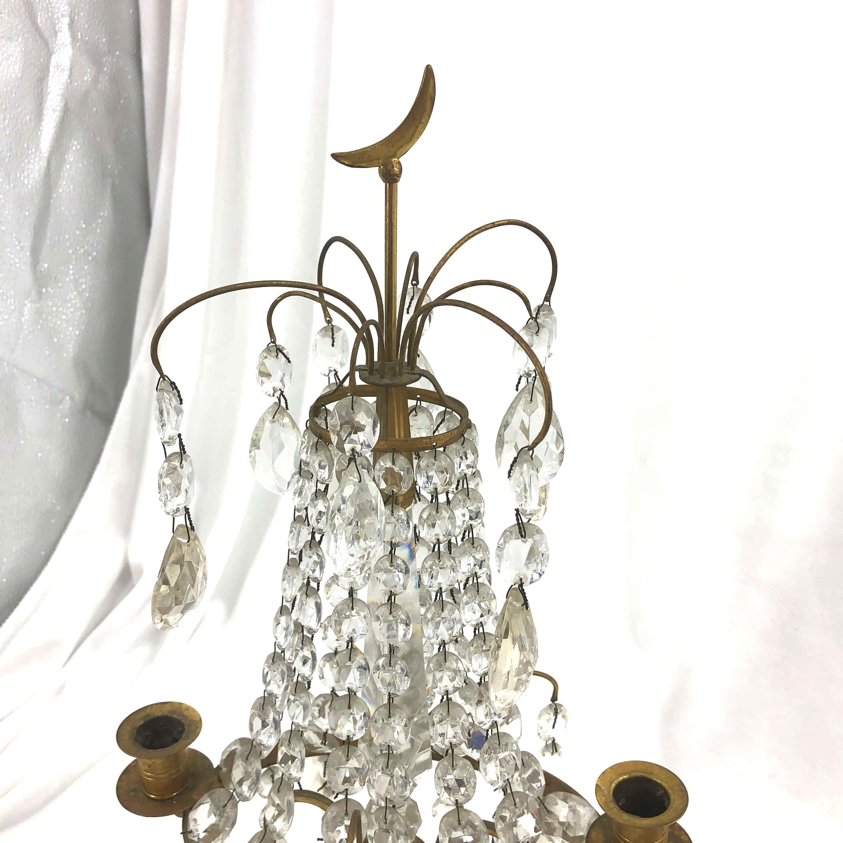 A pair of Baltic crystal, bronze, cobalt glass and marble two-light candelabra.