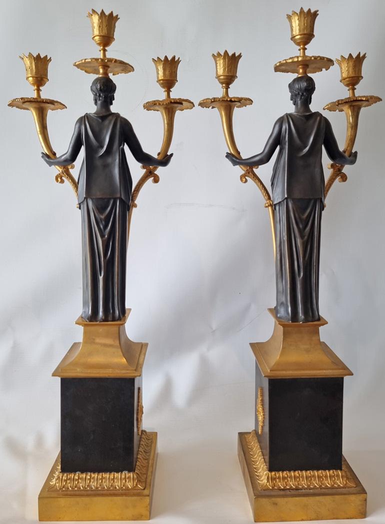 Pair of Baltic or Russian patinated bronze and ormolu figural candelabra In Good Condition For Sale In London, GB