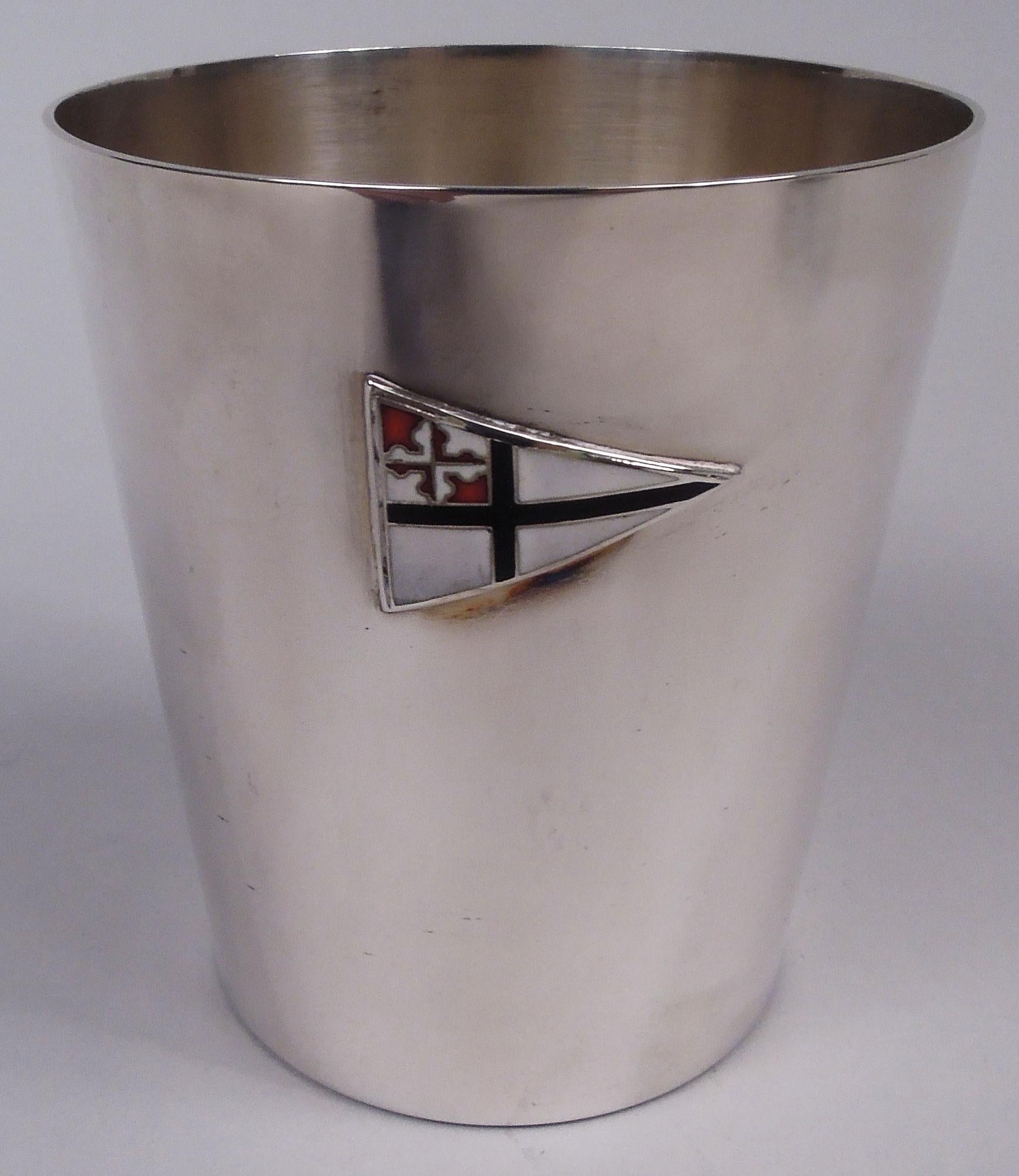 Pair of sterling silver tumblers. Made by Schofield Co. Inc. in Baltimore. Straight and tapering sides with applied enamel burgee for the yacht squadron of the Gibson Island Club in Chesapeake Bay. Smart and Modern with strong regional associations.