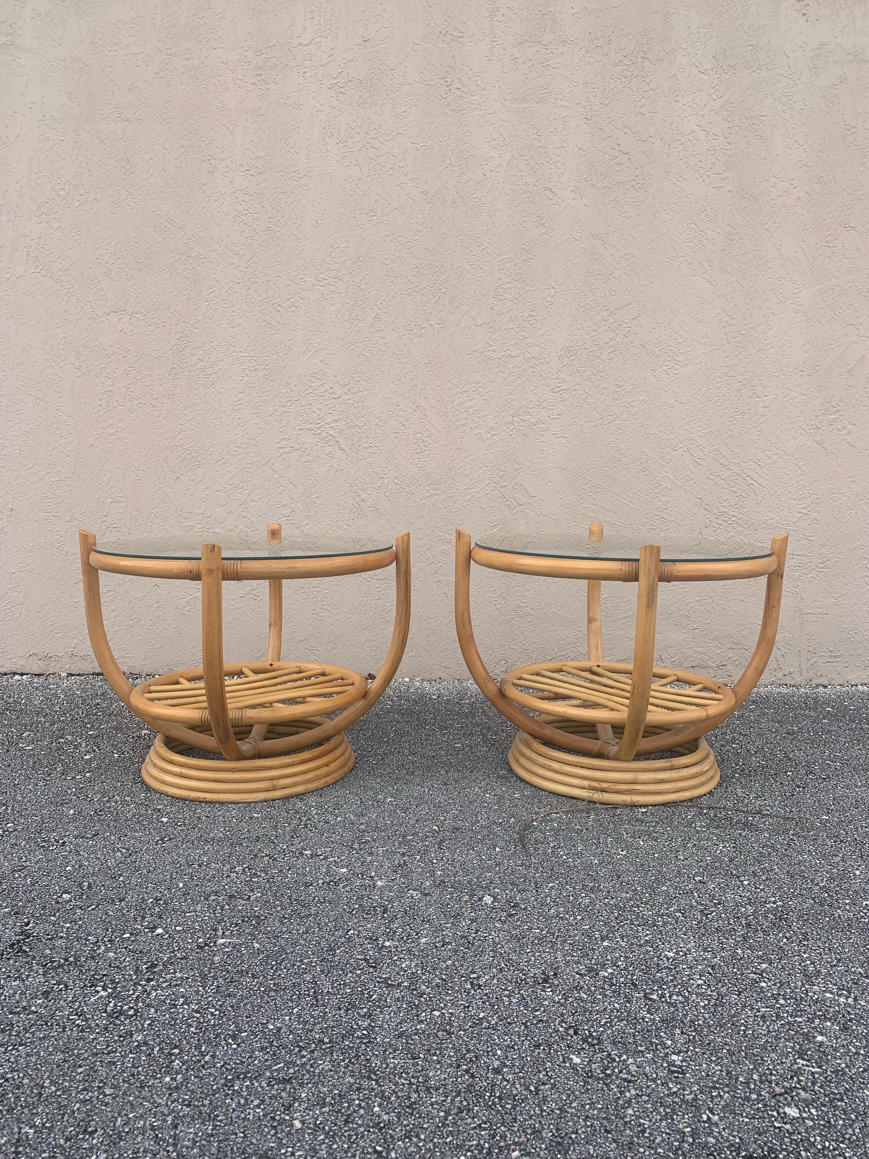 Unique bamboo side tables with glass tops. Striking flowing design between the Paul Frankyl style base and the four pronged table supports. 

Lots of negative space in the design allowing for a breathing and natural feel. A healthy mix of mid