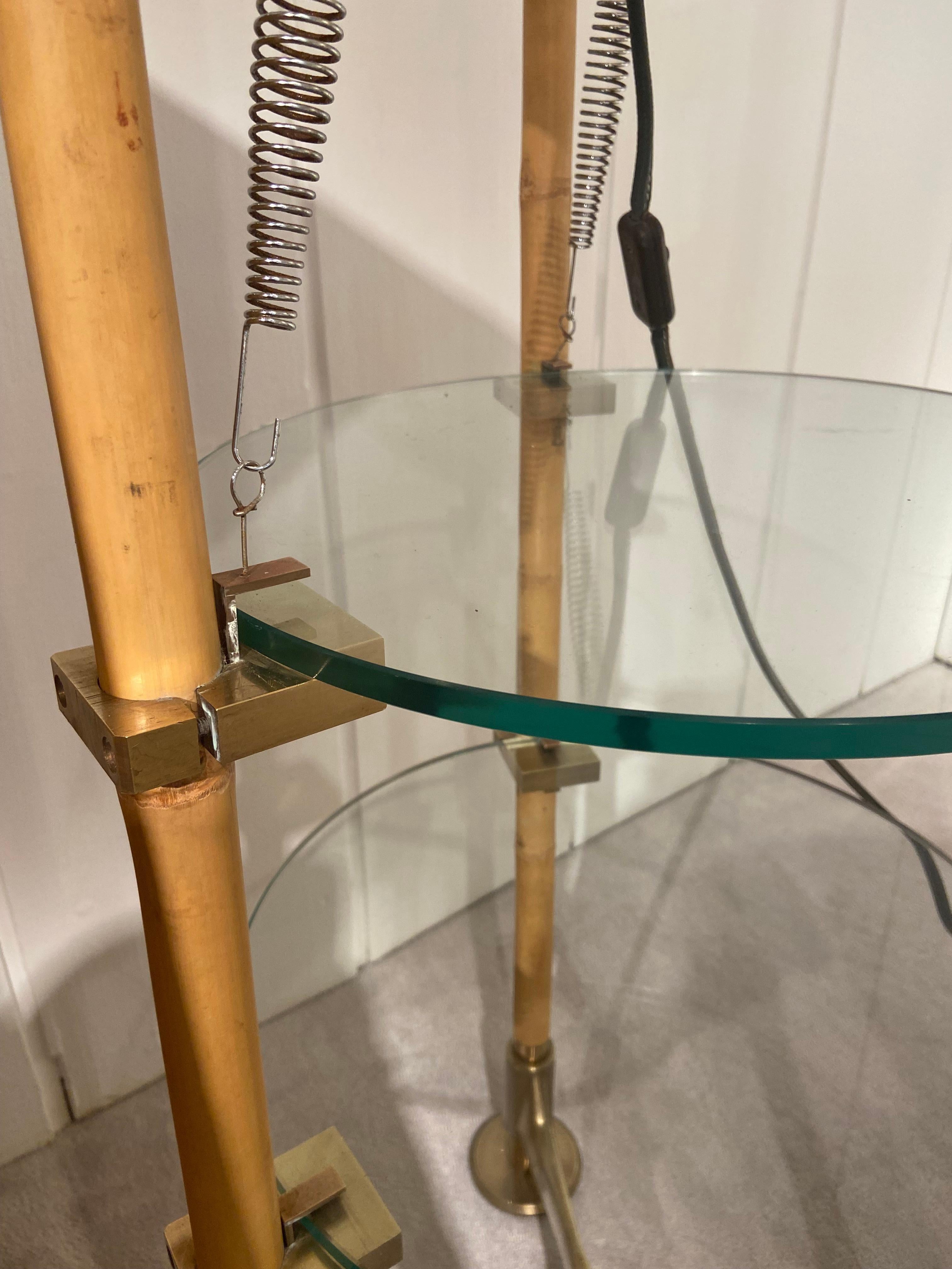 Pair of bamboo and leather floor lamps by Ronald Cecil Sportes  In Good Condition For Sale In Saint-Ouen, FR