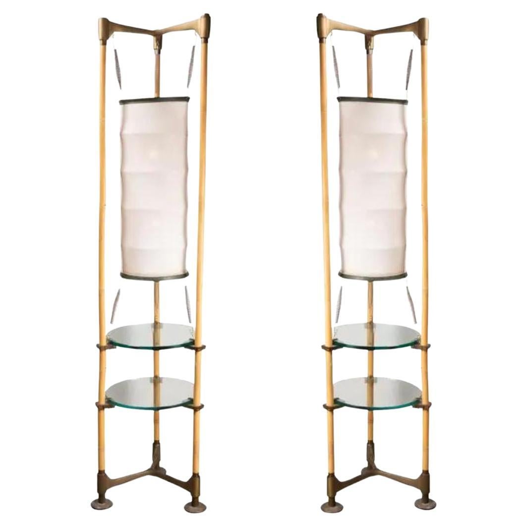 Pair of bamboo and leather floor lamps by Ronald Cecil Sportes  For Sale